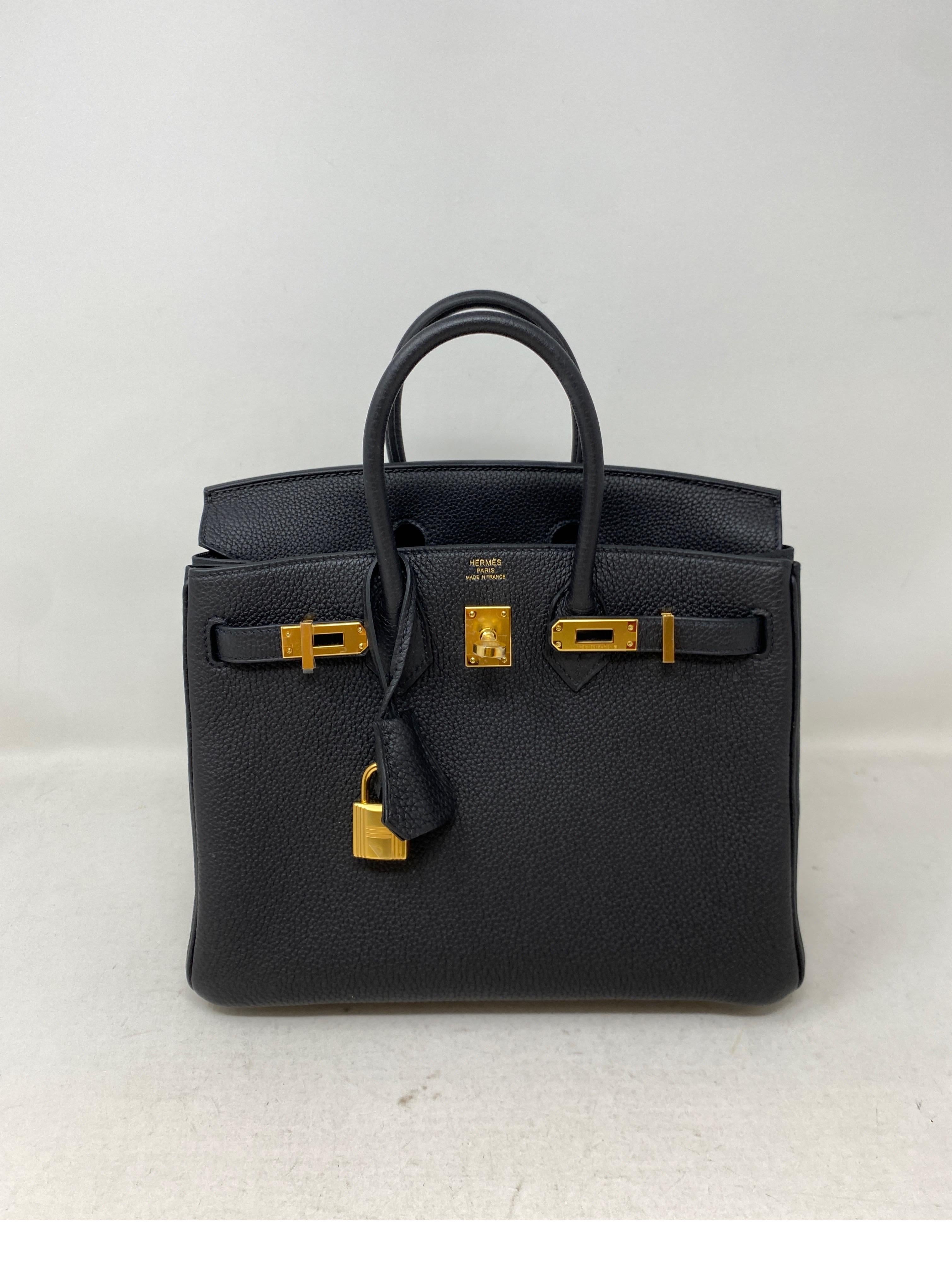 Hermes Black Birkin 25 Bag. Brand new Birkin 25. Rarest size to find. Most wanted black and gold hardware. Unicorn bag. Togo leather. Great investment bag. Includes full set. Clochette, lock, keys, dust bag, rain jacket, and box all included. Would
