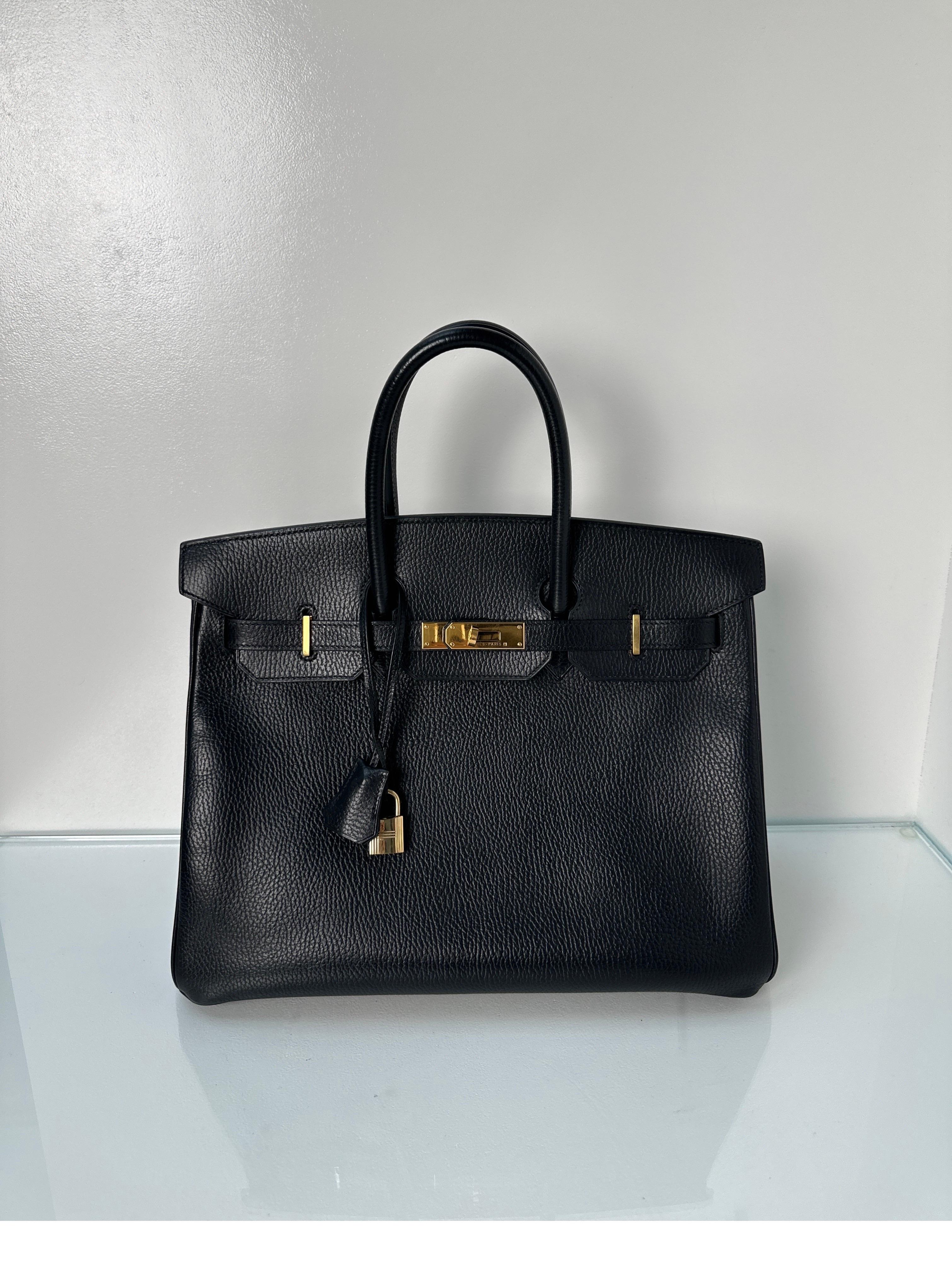 Hermes Black Ardennes Birkin 35 Bag. Very good condition. Vintage Birkin with retired leather ardennes. Highly coveted and with gold hardware. Classic combination and style. Interior clean. Corners looks great. Includes clochette, lock, keys, and