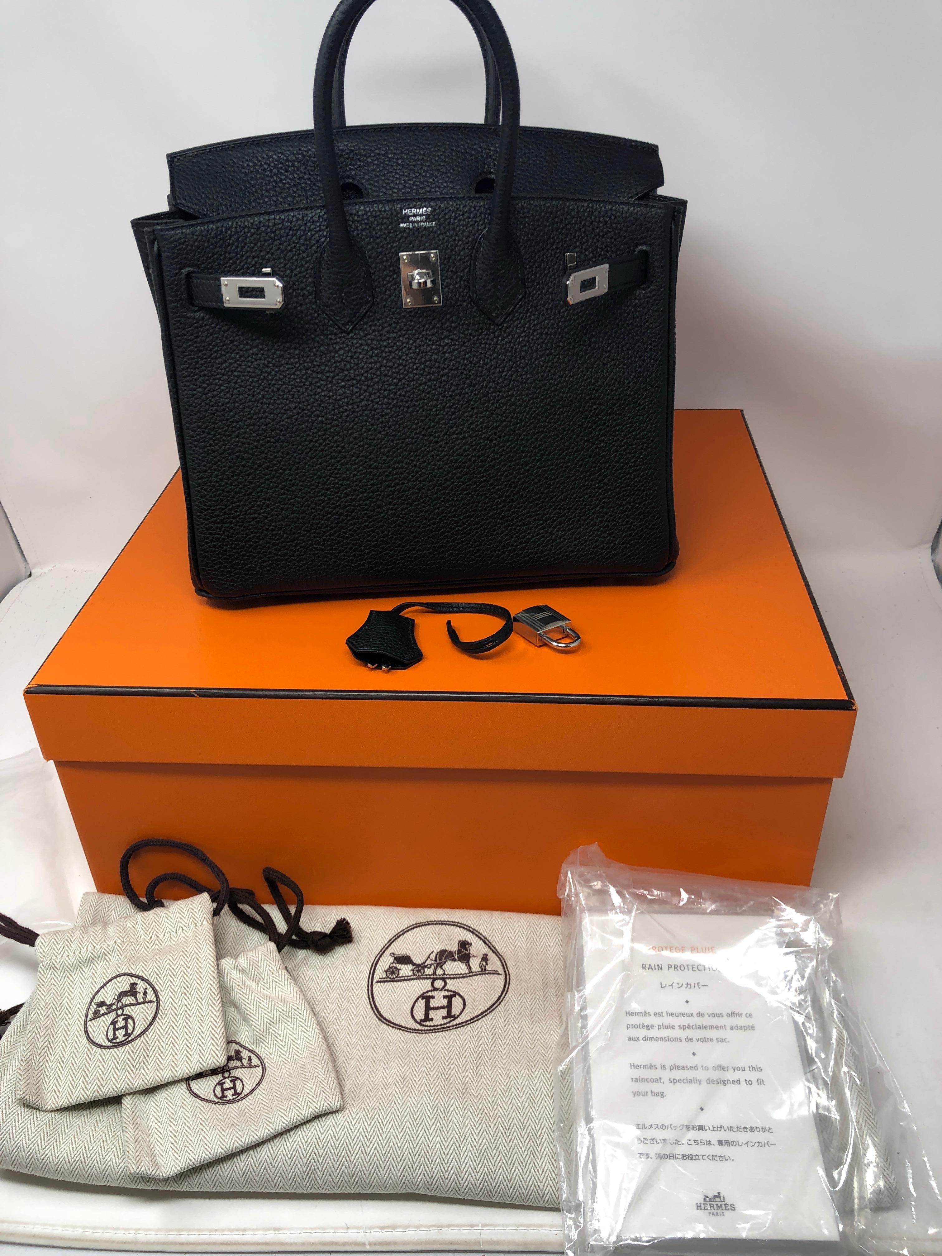 Hermes Black Birkin 25 Togo Leather. Palladium hardware. Brand New 2018. Never worn. Still has plastic on hardware. Own the Most Wanted Birkin of them all. The mini size 25. Extremely rare and hard to get size. Complete with Full set. Clochette,