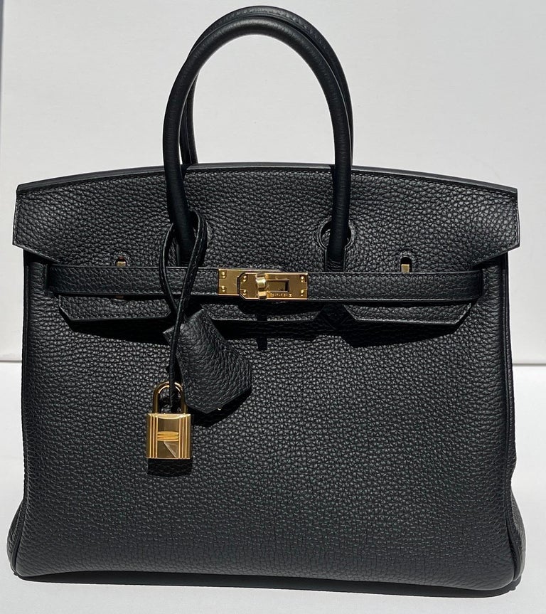Hermes Birkin 25cm
Black Togo
Gold Hardware
Tonal Stitching
Collection: U
2022
Interior zipper pocket with engraved Hermes pull
Lock and 2 keys
Clochette


Comes with redacted receipt Purchased in June 2022 from Hermes
A true treasure!

Hermes Box,