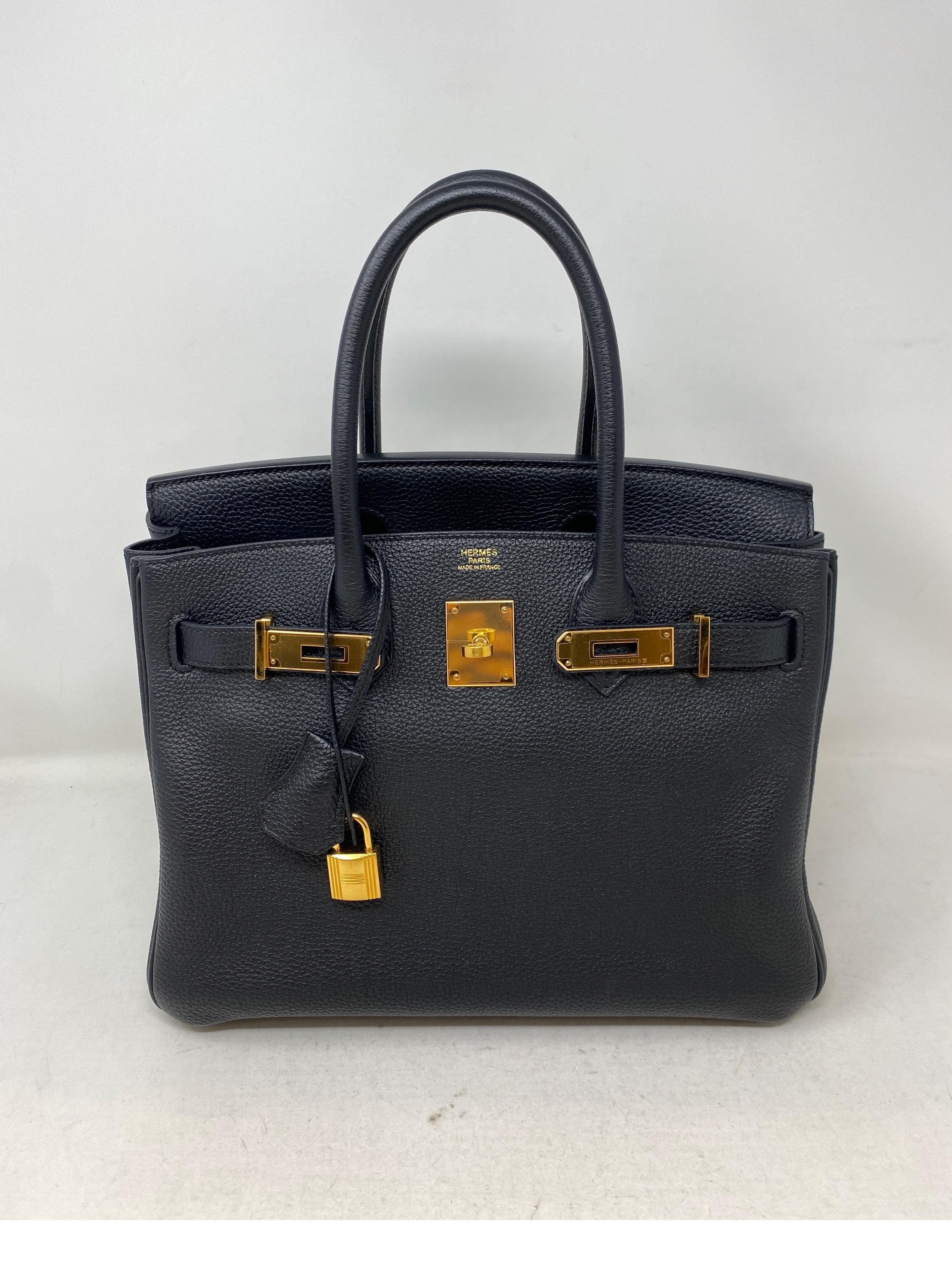 Hermes Black Birkin 30 Bag. Gold hardware. Excellent like new condition. Newer bag. Most wanted size and combination. Hard to get black. Don't miss out. Includes clochette, lock, keys, and dust cover. Guaranteed authentic. 