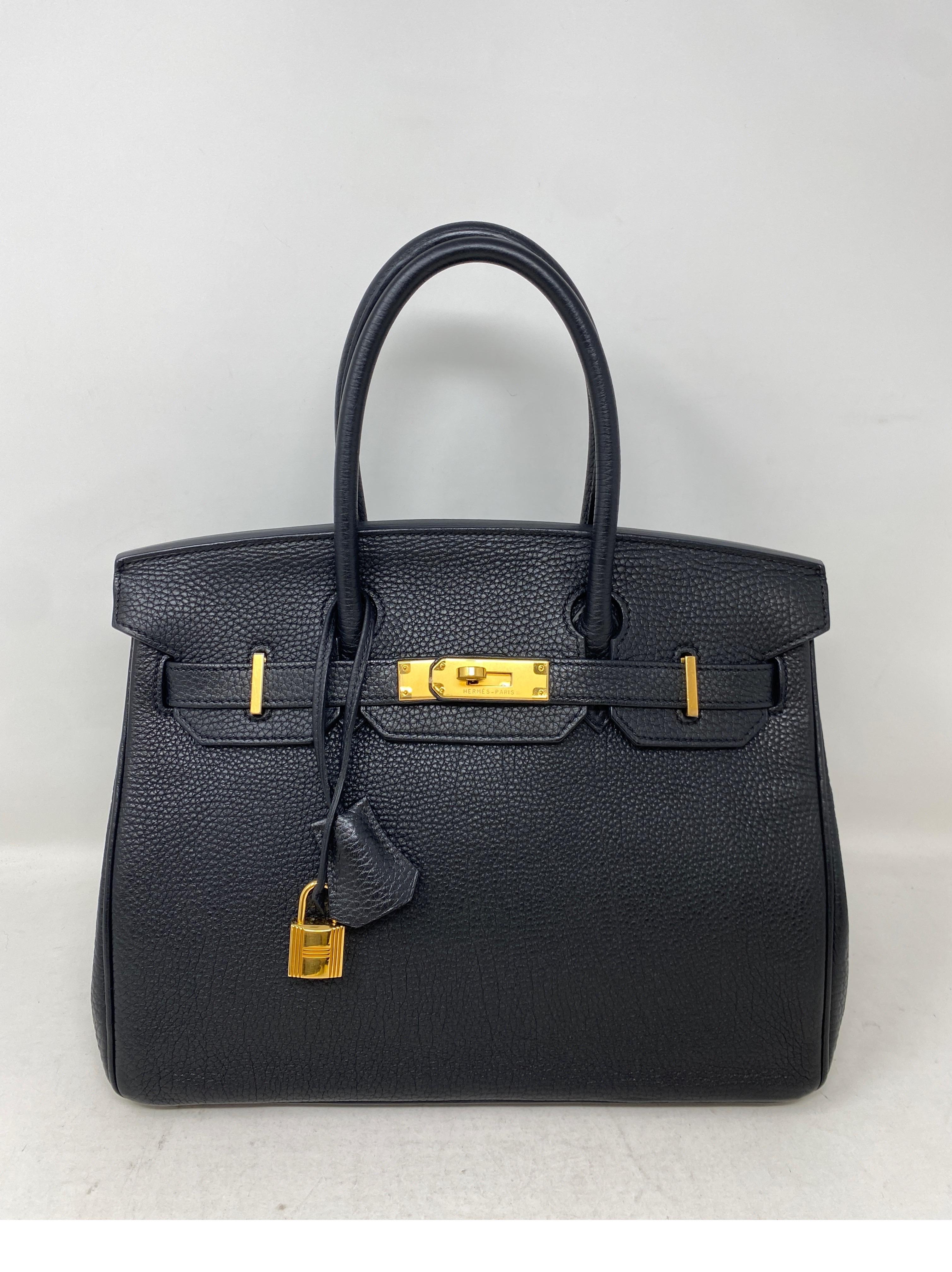 Hermes Black Birkin 30 Bag. Excellent condition. Black togo leather with gold hardware. Classic most wanted size. Interior clean. Great investment bag. Includes clochette, lock, keys, and dust bag. Guaranteed authentic. 