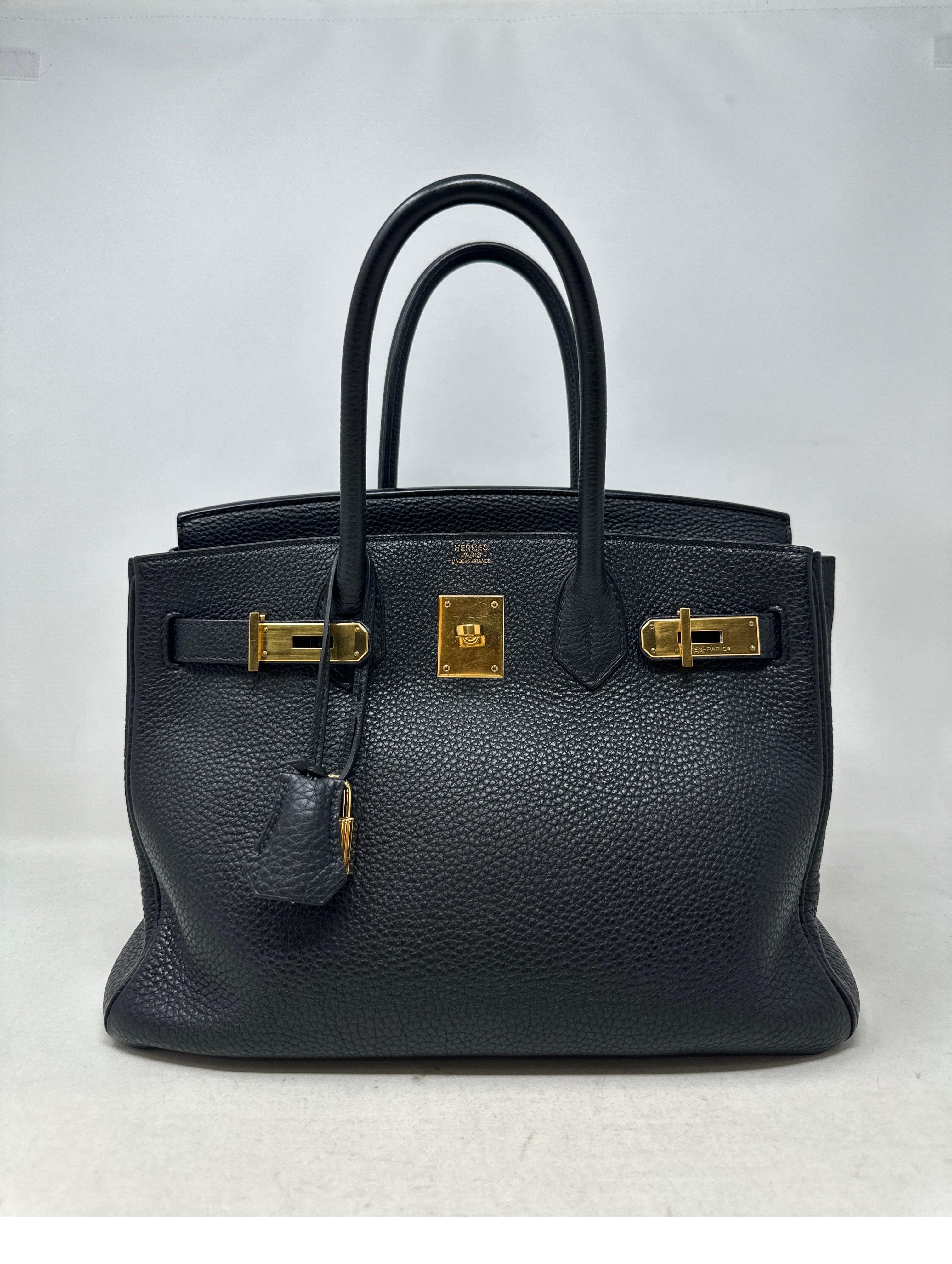 Hermes Black Birkin 30 Bag. Good condition. Gold hardware. Interior clean. Togo leather. Includes clochette, lock, keys, and dust bag. Classic black with most wanted size 30. Highly desired combination. Includes clochette, lock, keys, and dust bag.