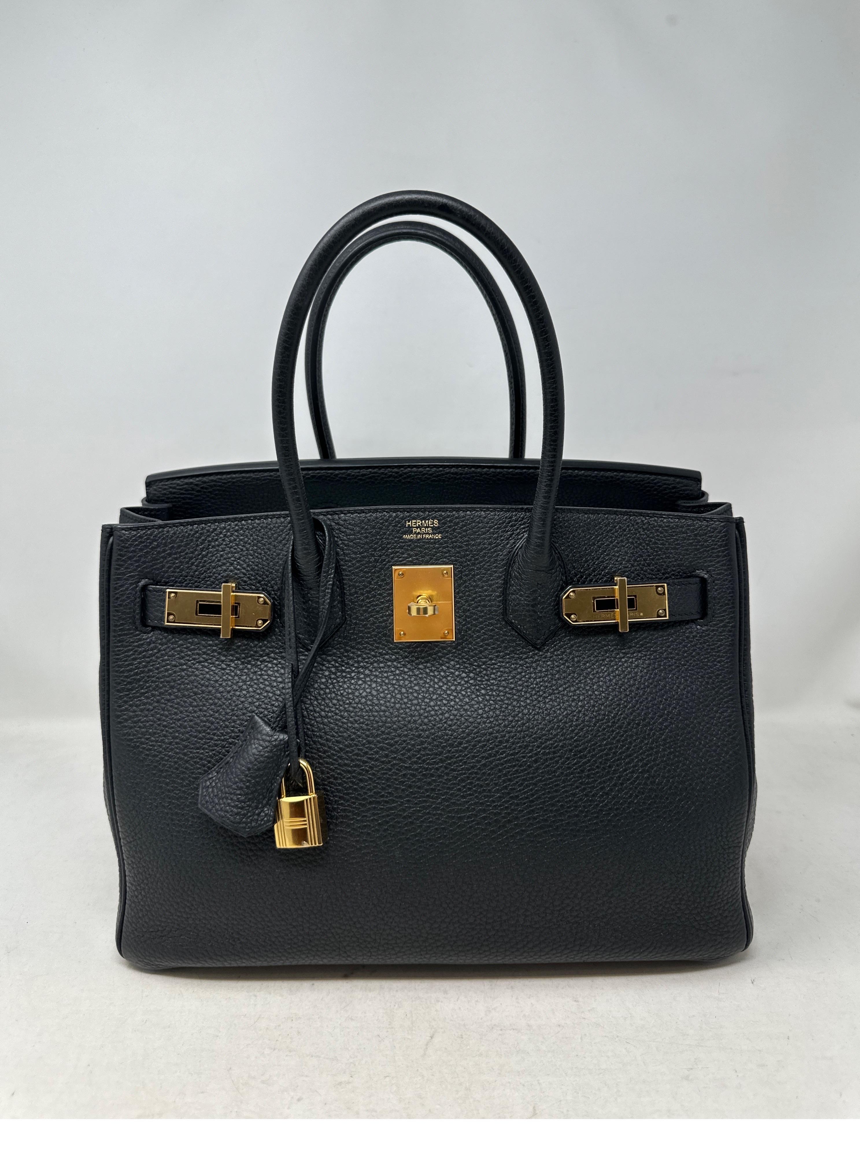 Hermes Black Birkin 30 Bag. Rose gold hardware. Togo leather. Excellent condition. Rare rose gold hardware. Interior clean. Includes clochette, lock, keys, and dust bag. Most wanted black color and size 30. Guaranteed authentic. 