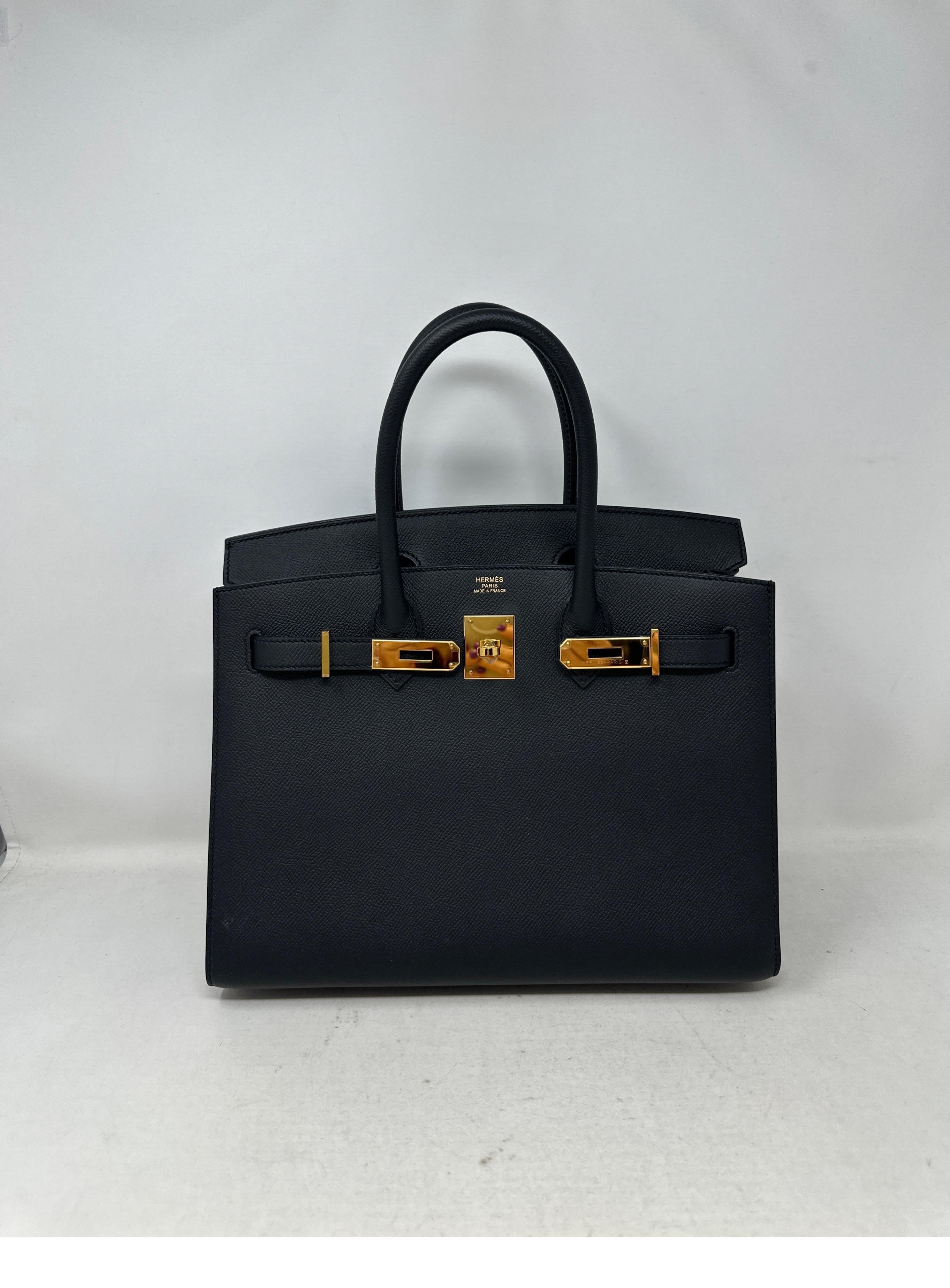 Hermes Black Sellier Birkin 30 Bag. New bag. Plastic still on hardware. Gold hardware. Sellier is high in demand. Great structured bag. Includes clochette, lock, keys, dust bag, receipt, and box. Full complete set. Guaranteed authentic. 