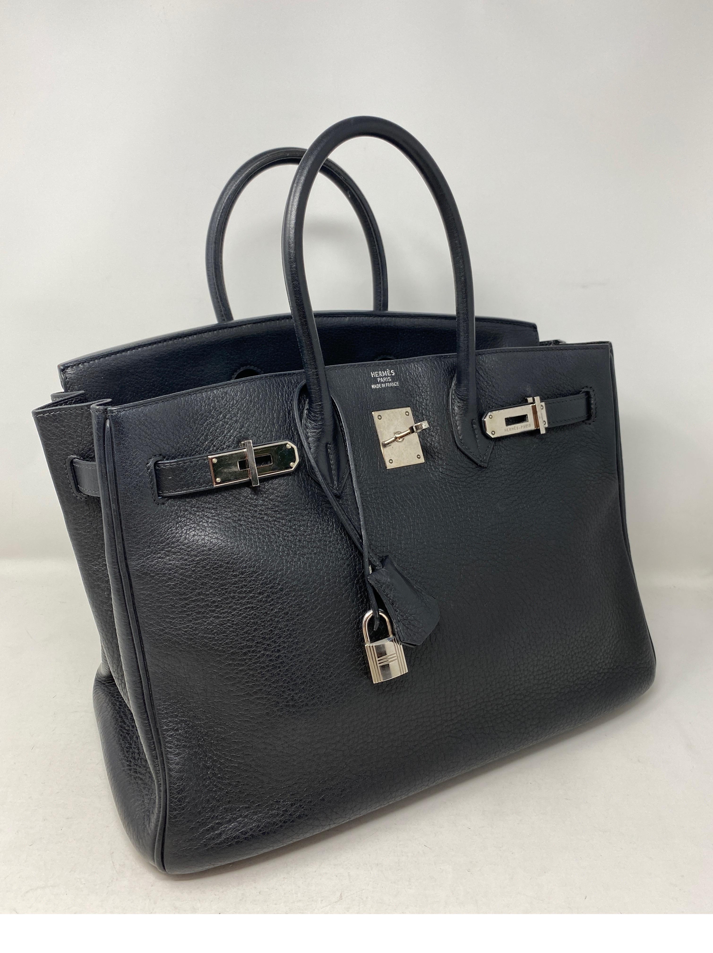Hermes Black Birkin 35 Bag. Palladium hardware. Some wear throughout. Lots of life left. Still in good condition. Classic black color. Includes clochette, lock, keys and dust cover. Guaranteed authentic. 