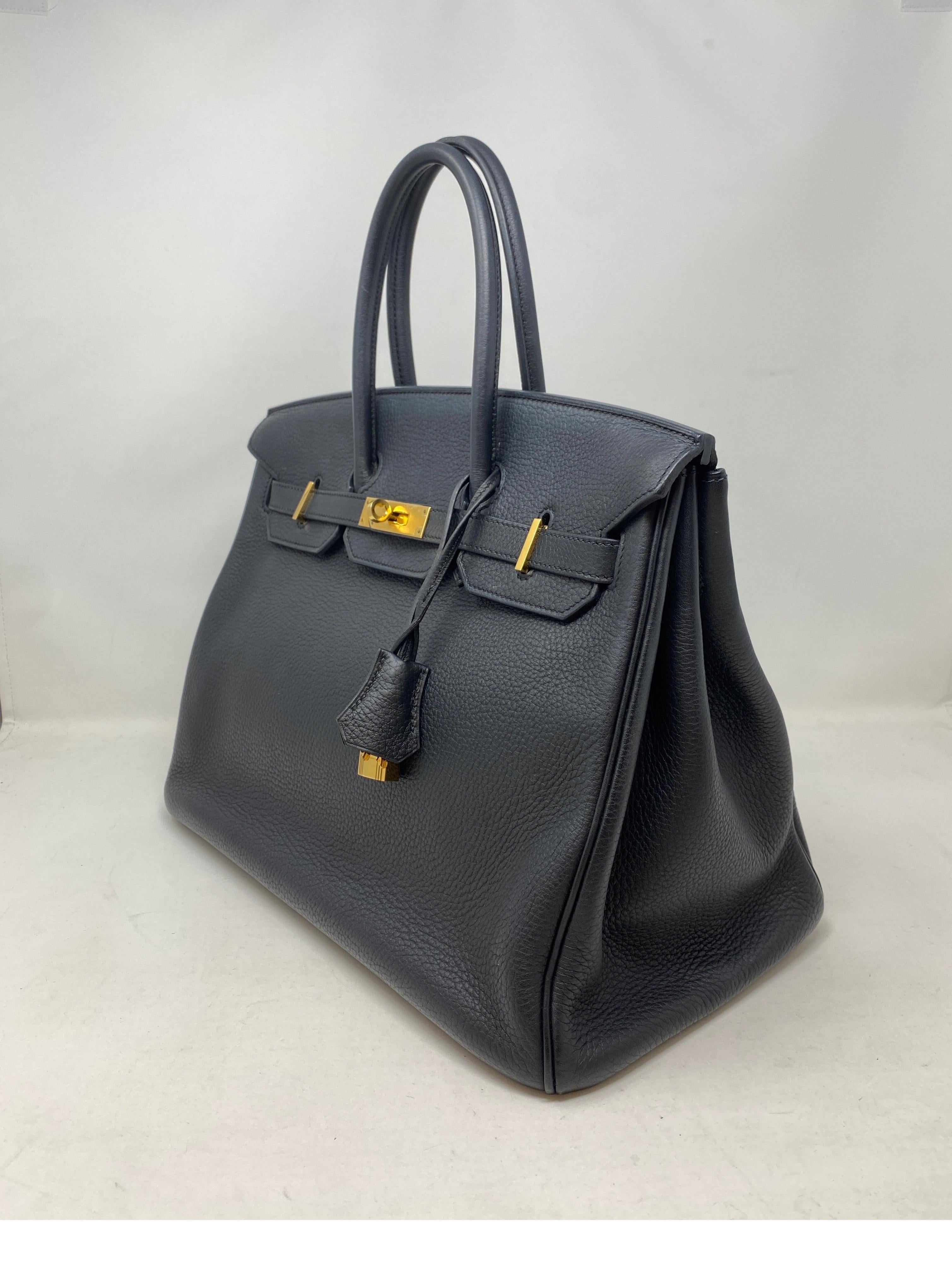 Hermes Black Birkin 35 Bag. Gold hardware. The most wanted combination. Beautiful bag in excellent condition. Includes clochette, lock, keys, and dust cover. Best investment bag. Guaranteed authentic. 