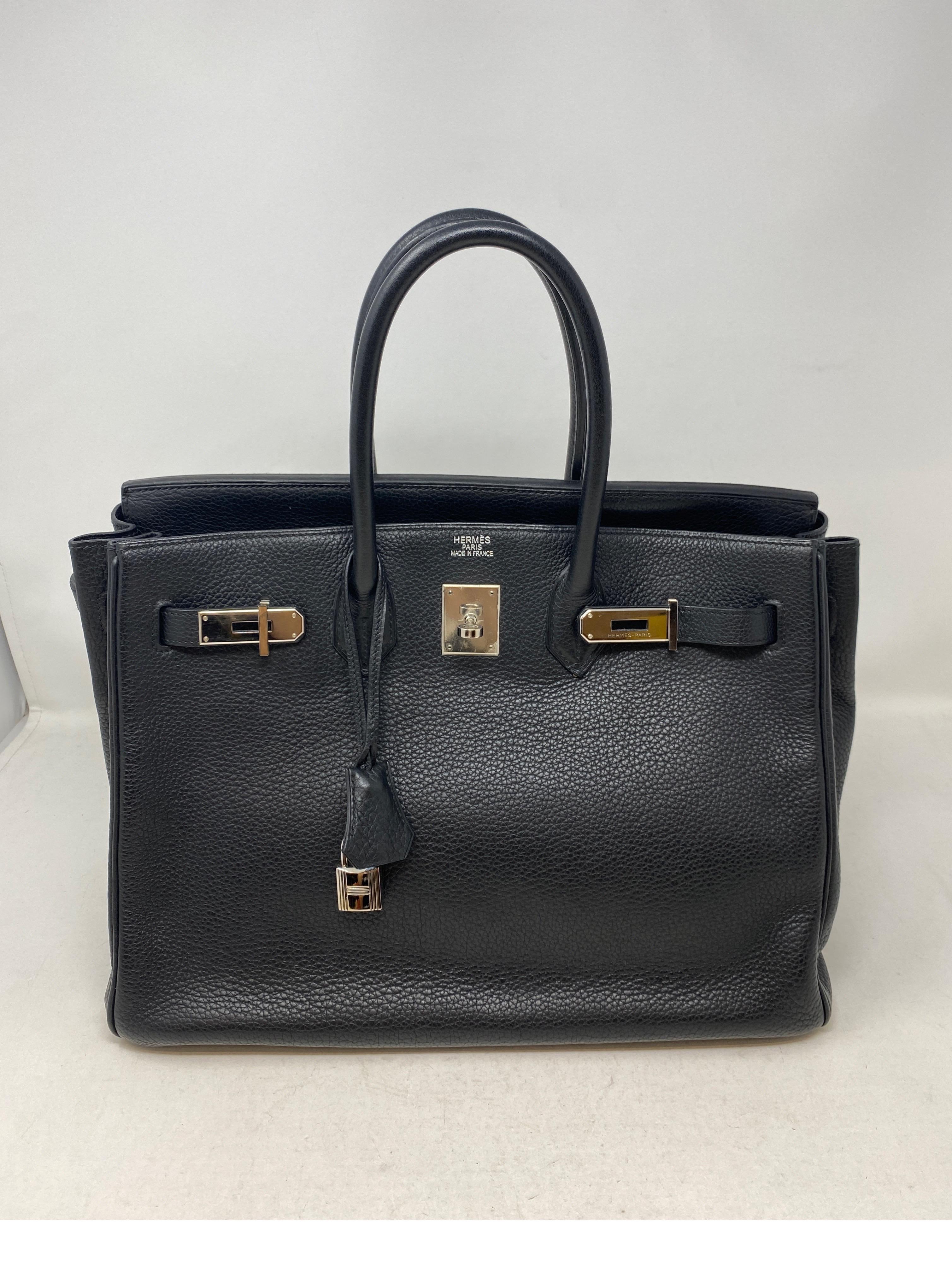 Hermes Black Birkin 35 Bag. Classic black color with palladium hardware. Excellent condition. Clemence leather. Beautiful and sturdy bag. Includes clochette, lock, keys, and dust cover. Guaranteed authentic. 
