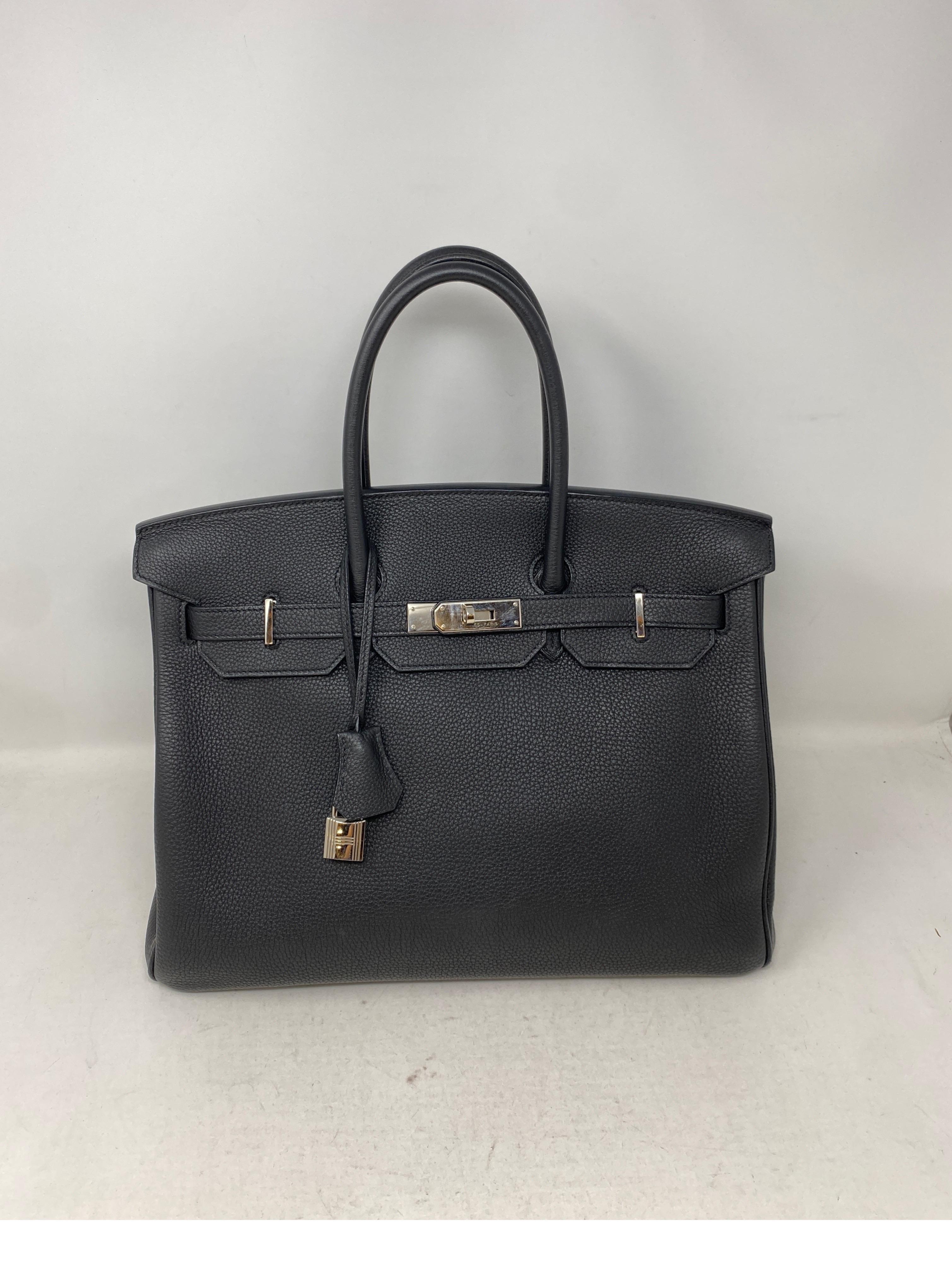 Hermes Black Birkin 35 Bag. Newer Birkin bag. Excellent condition. Palladium silver hardware. Togo leather. Classic and most desired black Birkin. Investment bag. Includes clochette, lock, keys, and dust cover. Guaranteed authentic. 