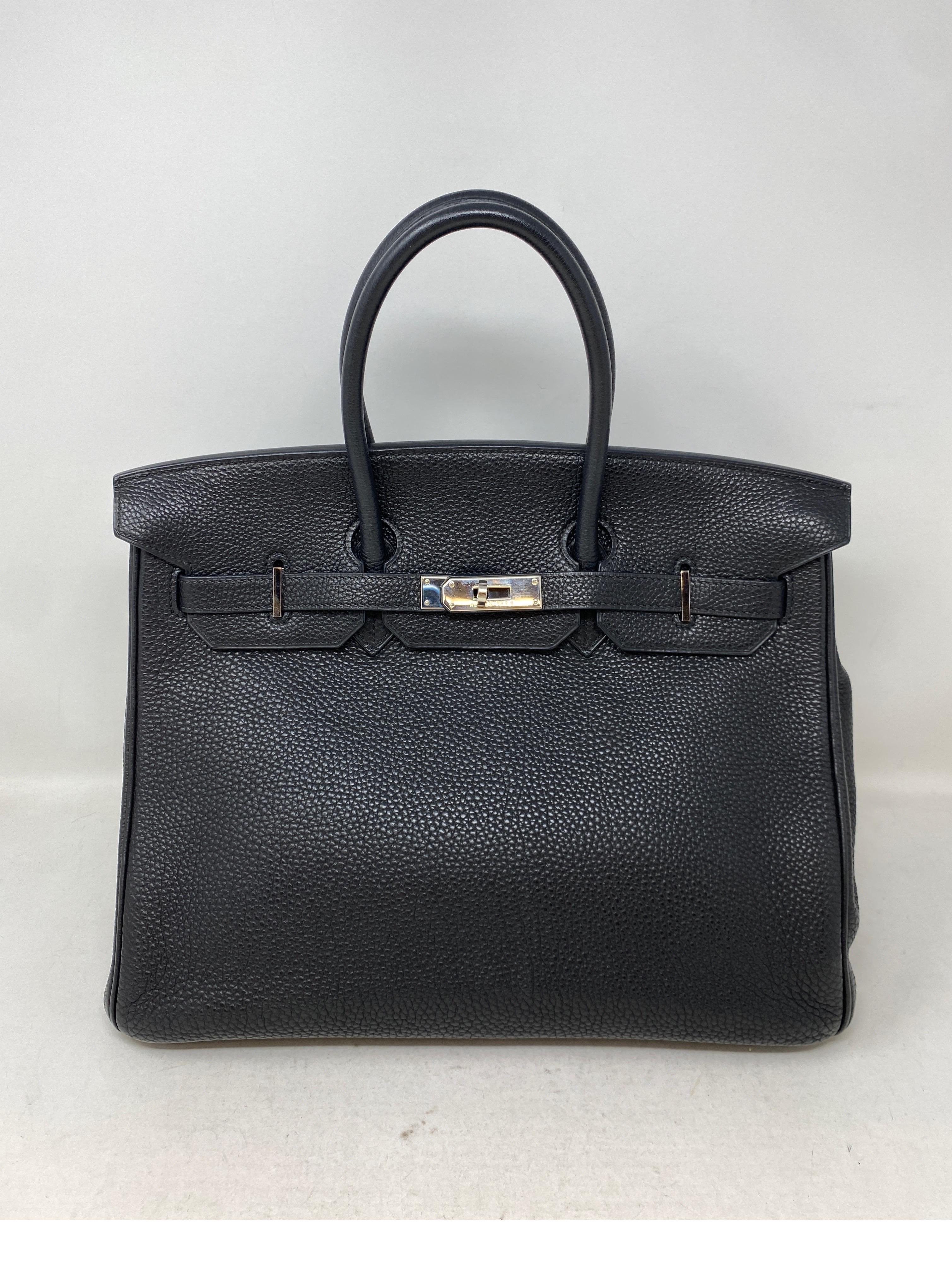 Hermes Black Birkin 35 Bag. Silver palladium hardware. Classic black. Most wanted color. Excellent condition. Includes clcohette, lock, keys, and dust bag. Guaranteed authentic. 