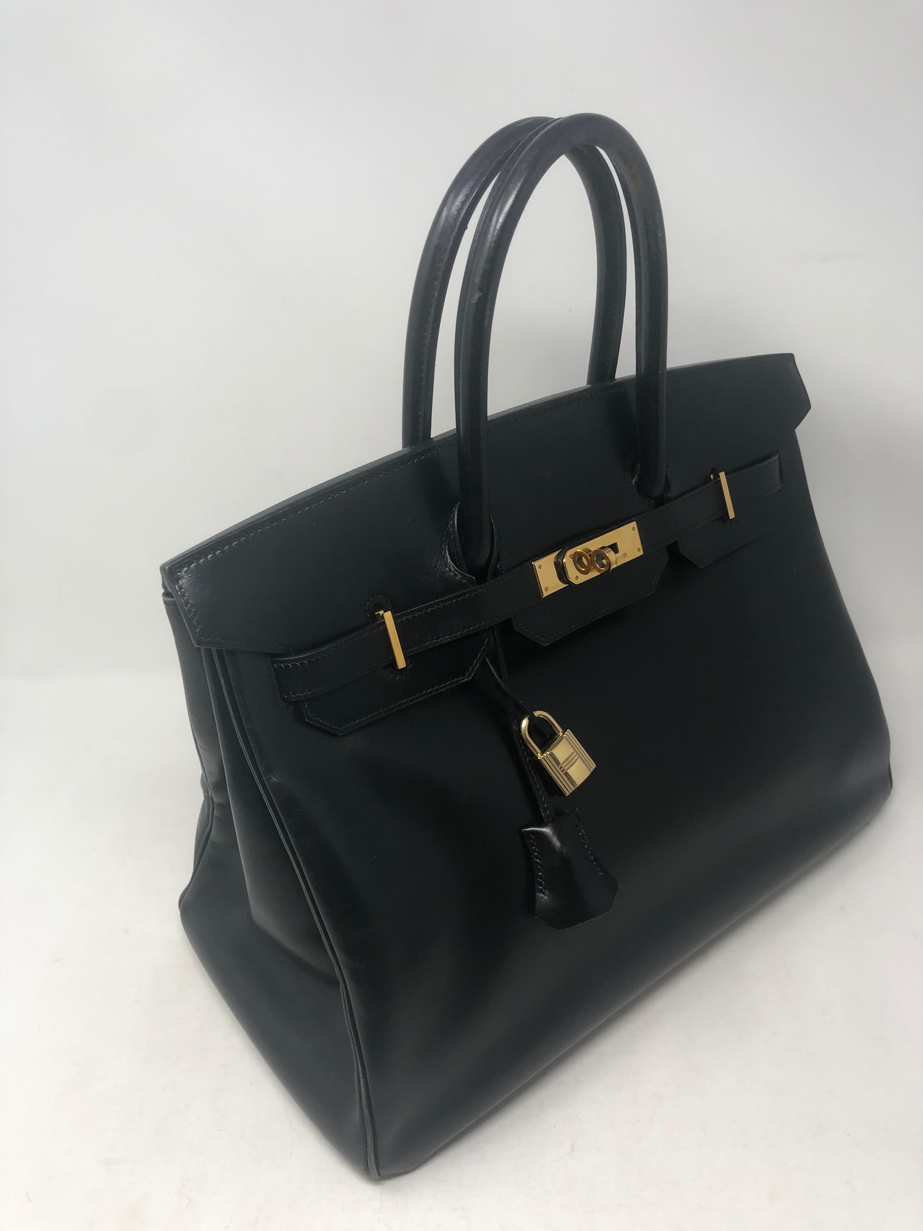 Hermes Black Birkin 35 Swift Leather. Gold hardware. Vintage and good condition. Wear on corners. Lots of life left. Beautiful smooth swift leather. Interior clean and no odors. Includes clochette, lock, keys and dust cover. Guaranteed authentic. 