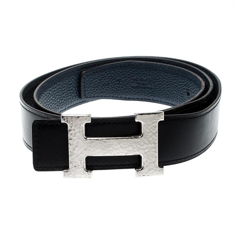 A celebrated design from the range of accessories by Hermès is their H buckle belts. They are worn by celebrities and fashion lovers around the world. Here, we have a reversible version, made from leather and coated with blue on one side and black