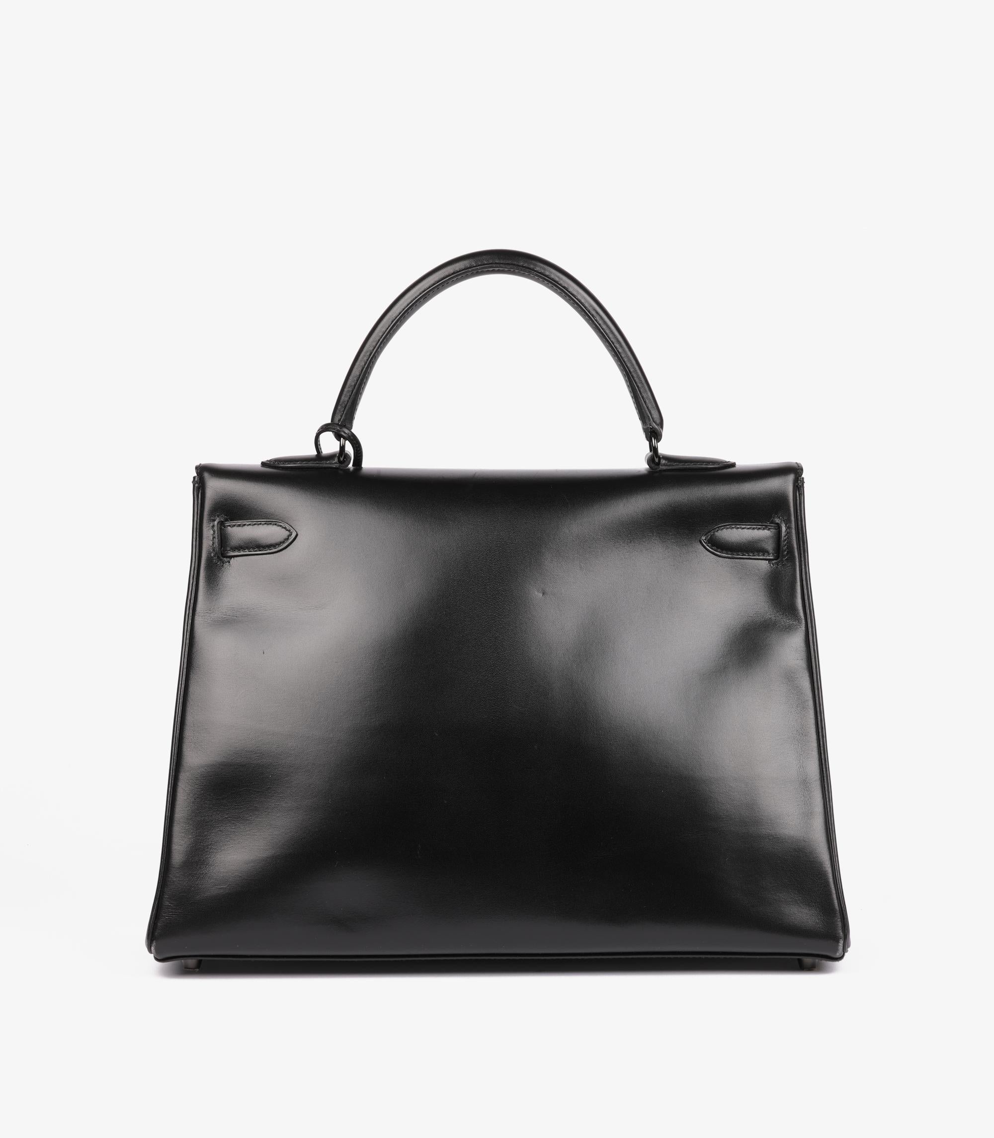 Hermès Boîte noire Cuir de veau SO Noir Kelly 35cm Retourne en vente 1
