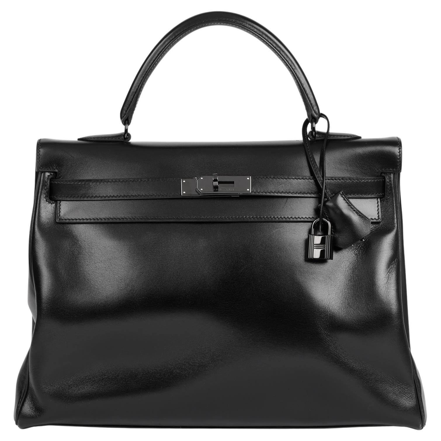 Hermès Boîte noire Cuir de veau SO Noir Kelly 35cm Retourne en vente
