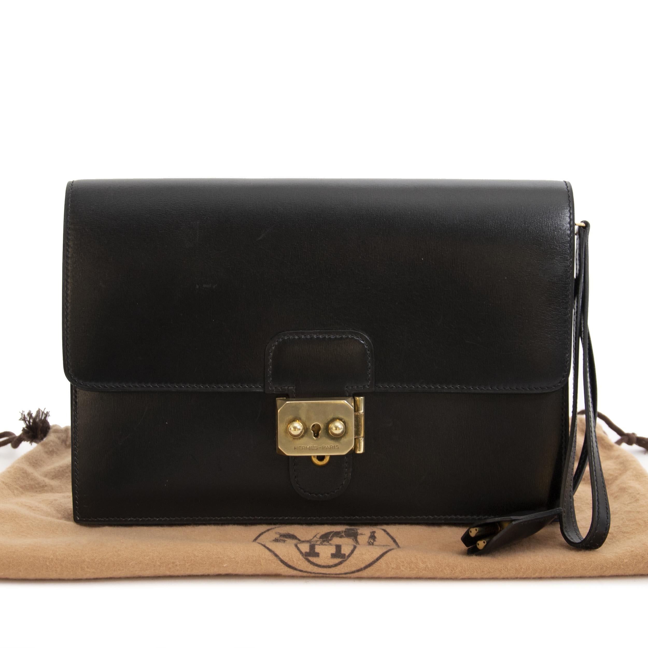 Very Good Condition

Hermes Black Box Calf Pochette Jet

We adore this extremely rare and practical 