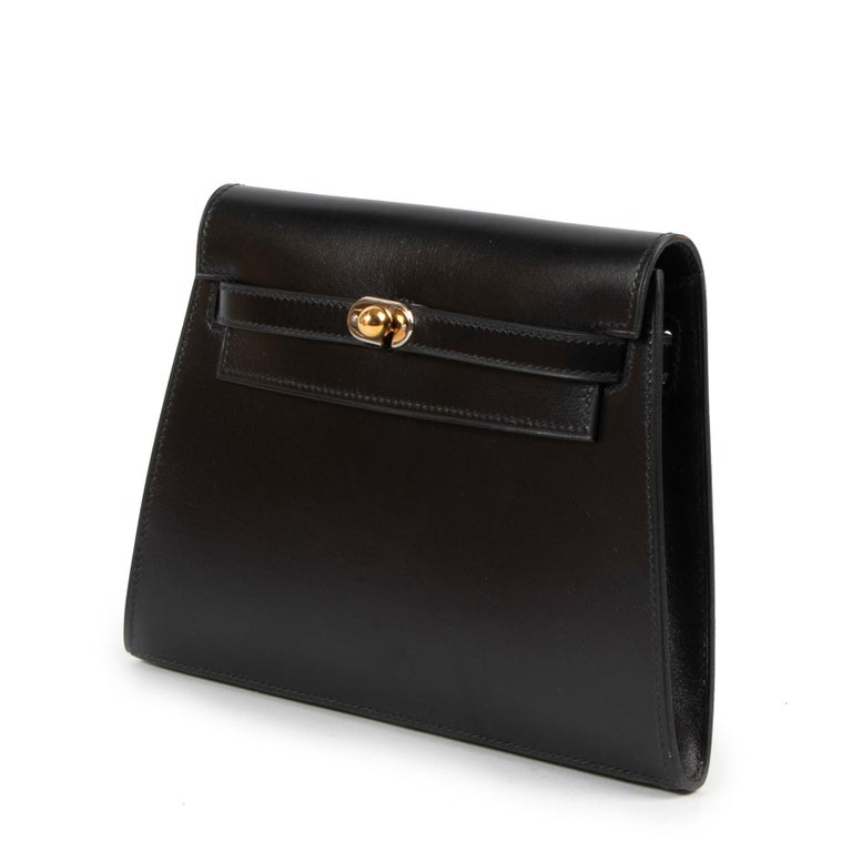 Hermès Black Box Calf Vintage Kelly Clutch

This absolutely gorgeous vintage Kelly clutch bag by Hermès is very unique and highly sought after.

A true collector's item, this fancy Kelly clutch will have heads turning!

Contrasting gold and silver