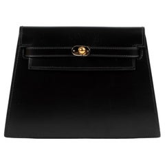 Hermès Schwarze Kelly Clutch aus Kalbsleder im Vintage-Stil