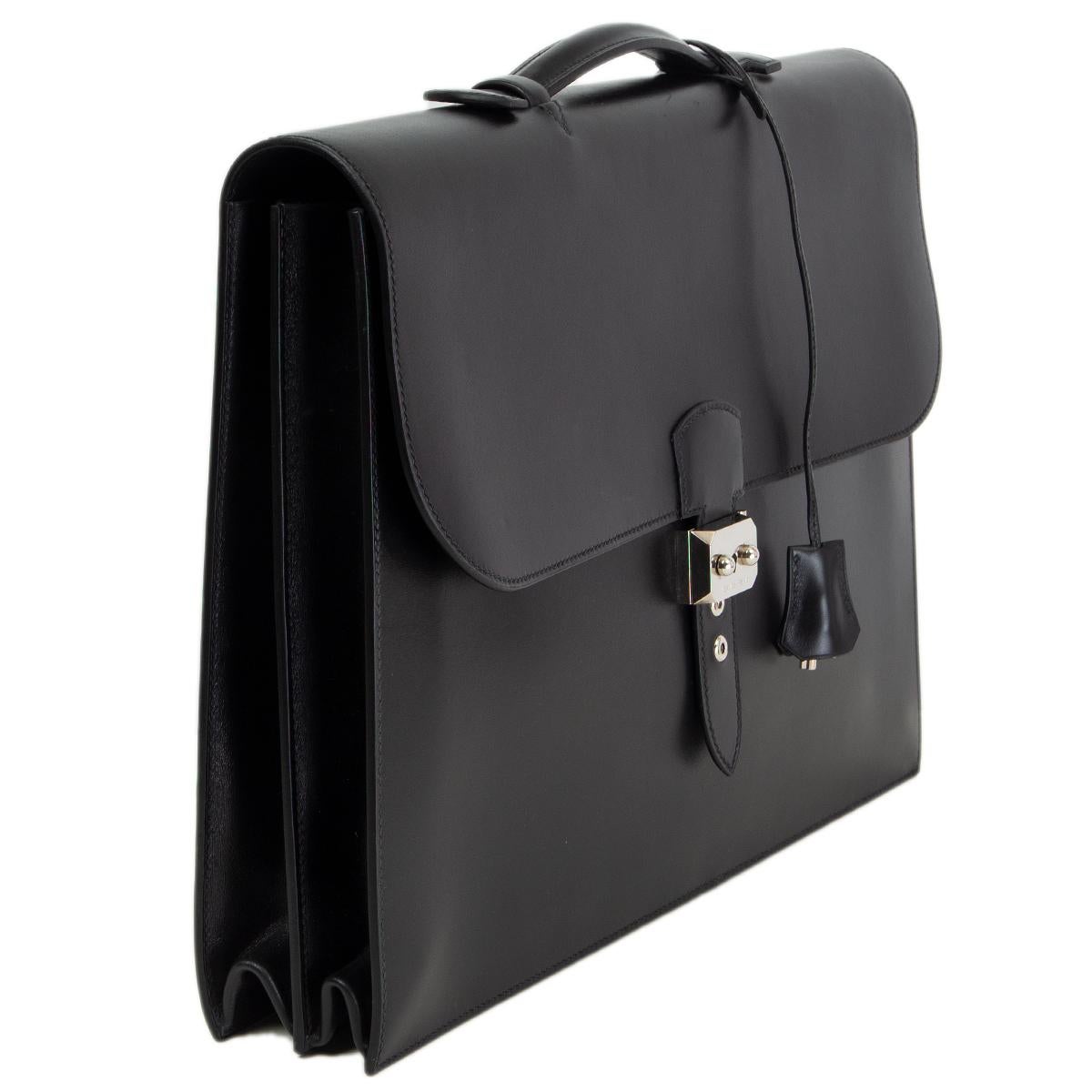 100% authentic Hermès Sac a Depeches 2-41 briefcase in noir Veau Box featuring Palladium flip-lock buckle. Interior is lined in noir Veau Box and has two main compartments and a big flat pocket at front. Has been carried once or twice and is in