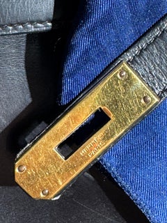 HERMÈS BLACK CALF BOX LEATHER RETOURNÉ KELLY 32 WITH GOLD PADLOCK and KEY, 1964