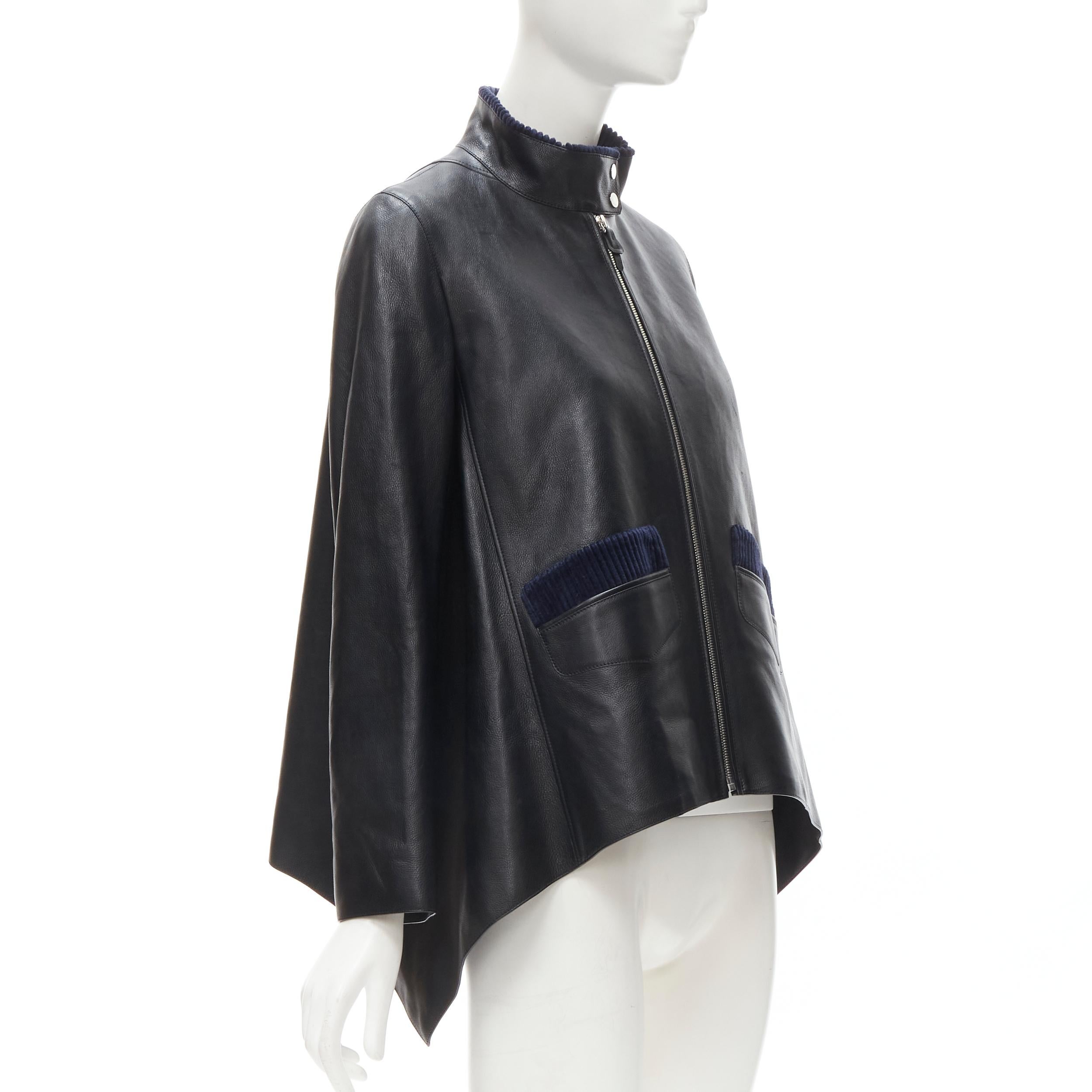 HERMES black calfskin leather navy corduroy trim cape flared leather jacket FR36
Brand: Hermes
Material: Leather
Color: Black
Pattern: Solid
Closure: Zip
Extra Detail: Black calfskin leather. Navy corduroy trimming at collar and at pockets.