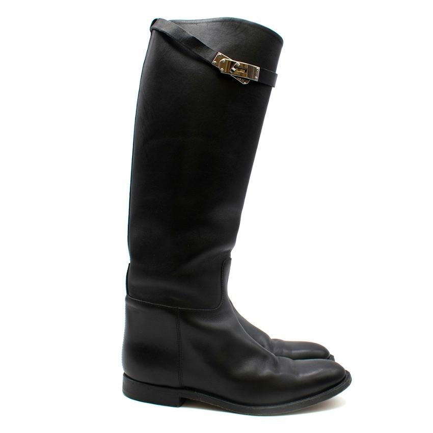 Hermes, Box Calfskin Riding Boot with iconic palladium plated buckle

- Twist Lock Strap buckle
- Made in France

Please note, these items are pre-owned and may show signs of being stored even when unworn and unused. This is reflected within the