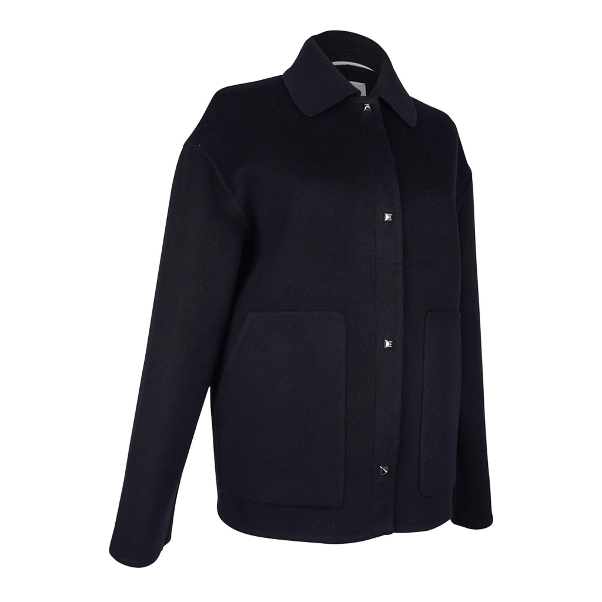 Mightychic offers an Hermes jacket featured in Black double sided Cashmere.
Sleek straight cut with Palladium plated Medor snap closures.
Timeless classic.
Snaps are reinforced with lambskin leather interior trim.
Drop Shoulder.
Two (2) front patch