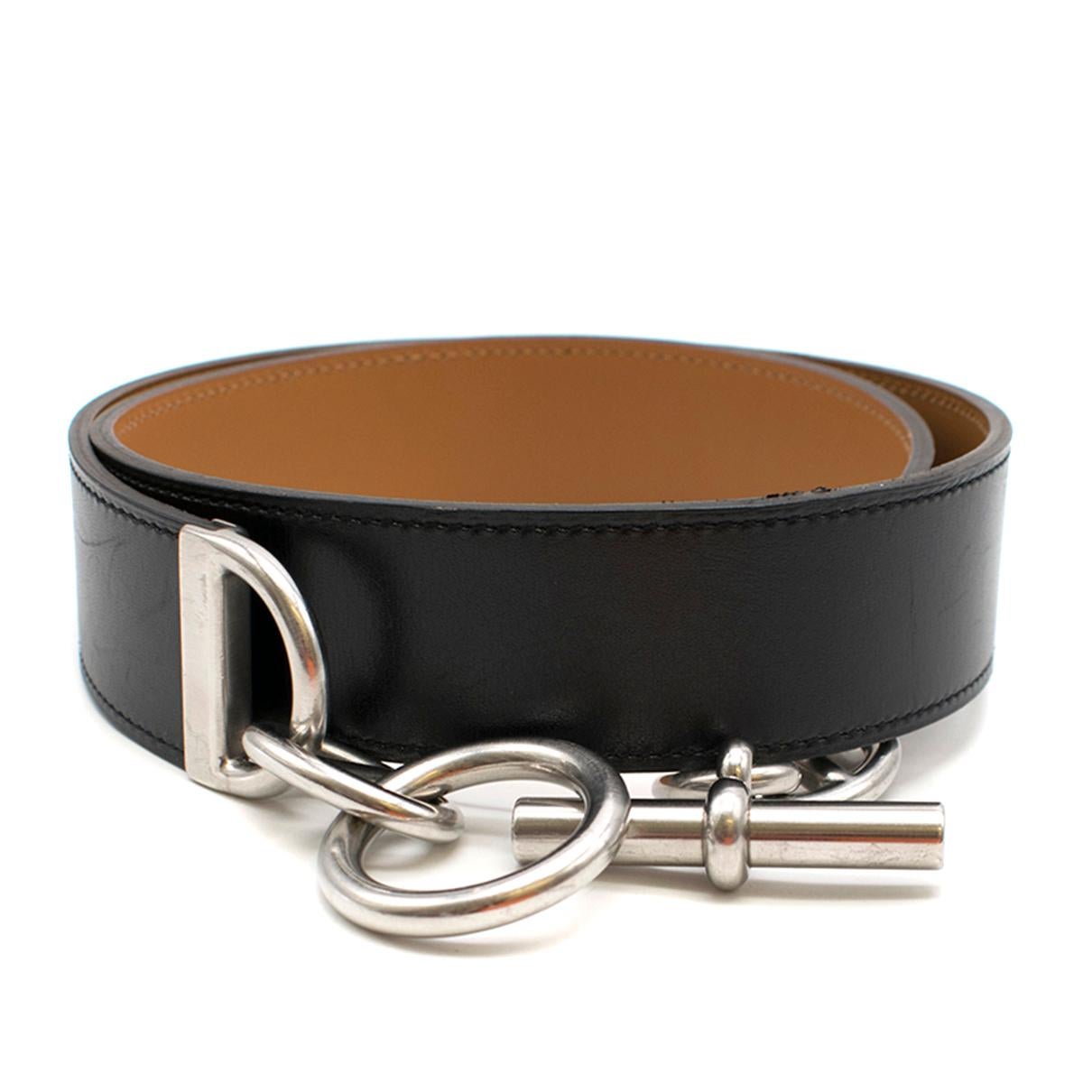 Hermès Black Chaine D'ancre Belt

- Serial number: [M]
- Year (circa): 2009 
- Black Leather Belt 
- T-bar chain fastening closure 
- Silver toned hardware 
- Brown leather lining 
- Black lacquered sides

This item comes with a box. 

Please note,