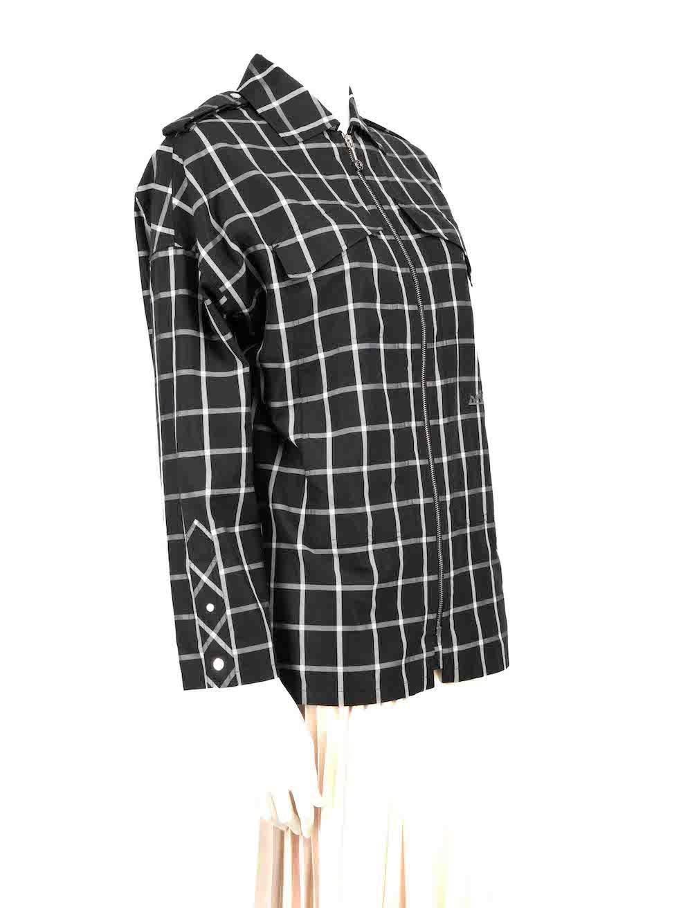 CONDITION is Very good. Hardly any visible wear to shirt is evident on this used Hermès designer resale item.
 
 Details
 Black
 Cotton
 Shirt
 Checkered pattern
 Long sleeves
 Zip fastening
 4x Front pockets
 
 
 Made in France
 
 Composition
 100%