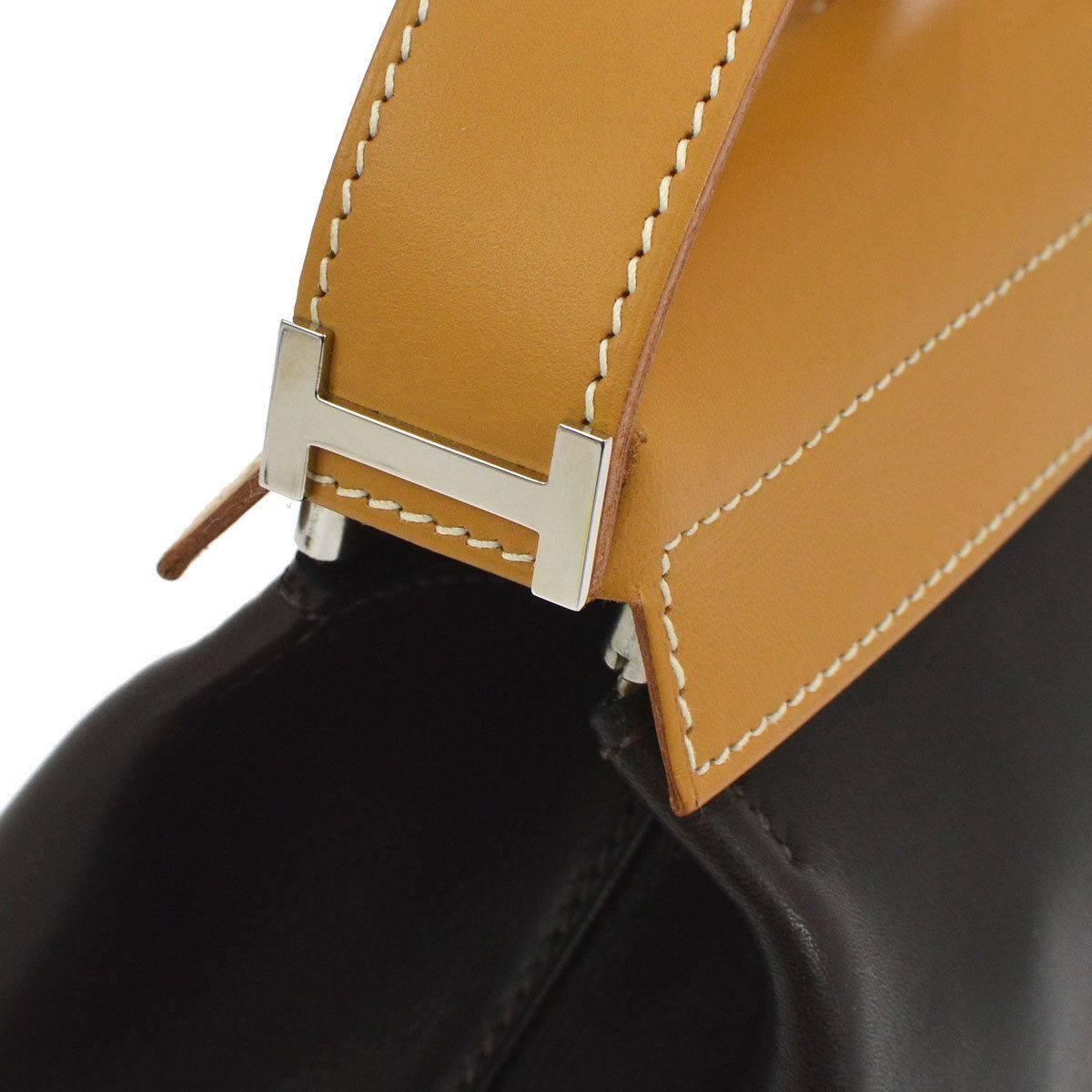 Hermes Black Cognac Leather Palladium 'H' Top Handle Evening Shoulder Bag

Leather
Palladium hardware
Zipper closure 
Made in France
Measures 12.5