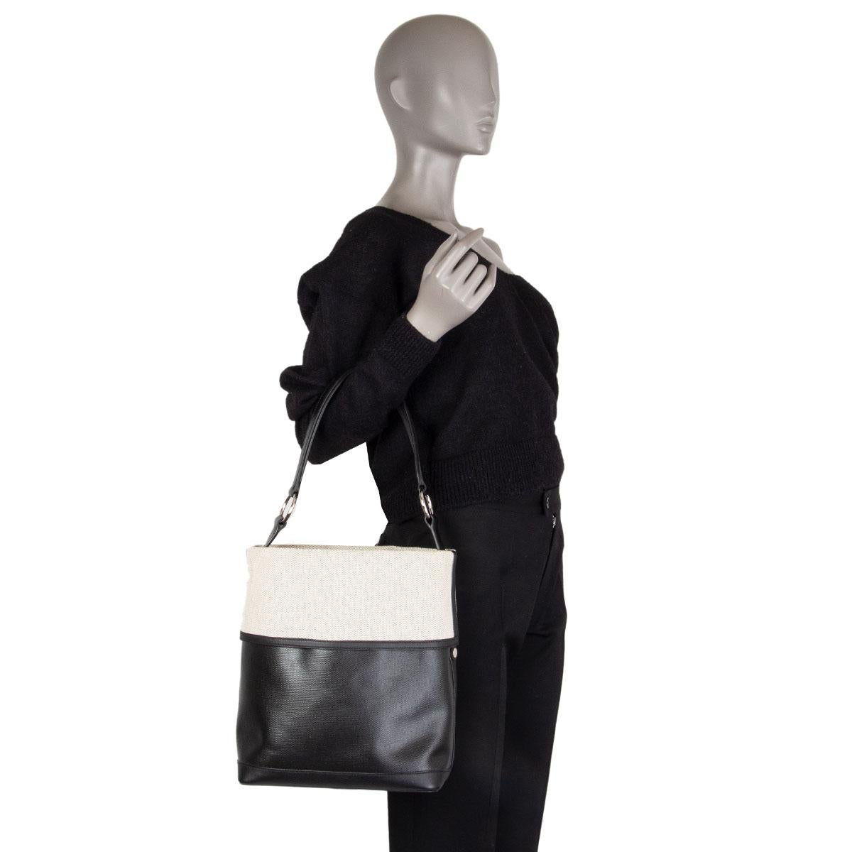 HERMES black COL ROULE 25 Bucket Bag Toile H Berline Swift Hunter In Excellent Condition In Zürich, CH