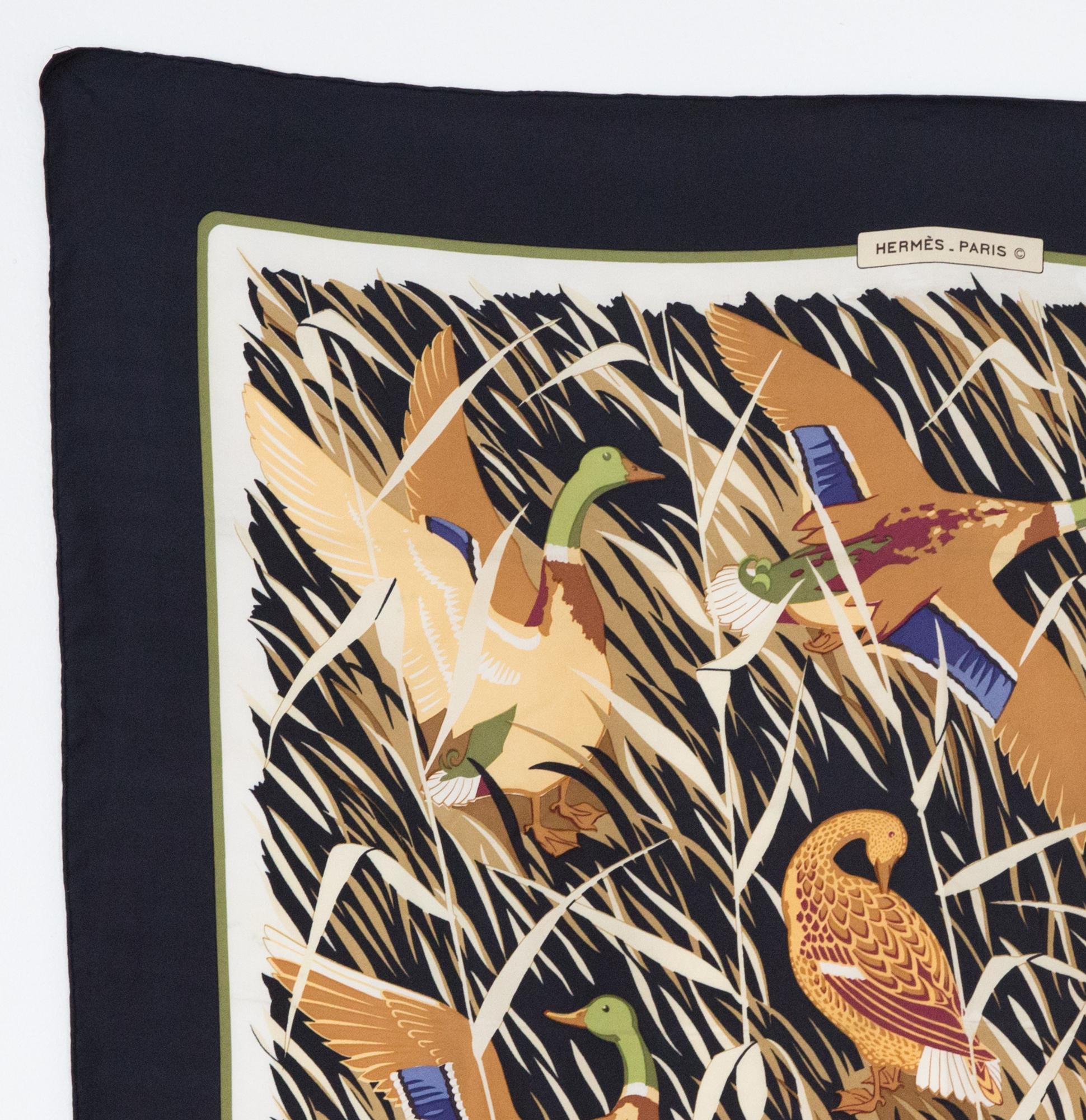 Hermes silk scarf Cols Verts by Christiane Vauzelles featuring a black border.
In excellent vintage condition. Made in France.
35,4in. (90cm)  X 35,4in. (90cm)
We guarantee you will receive this  iconic item as described and showed on