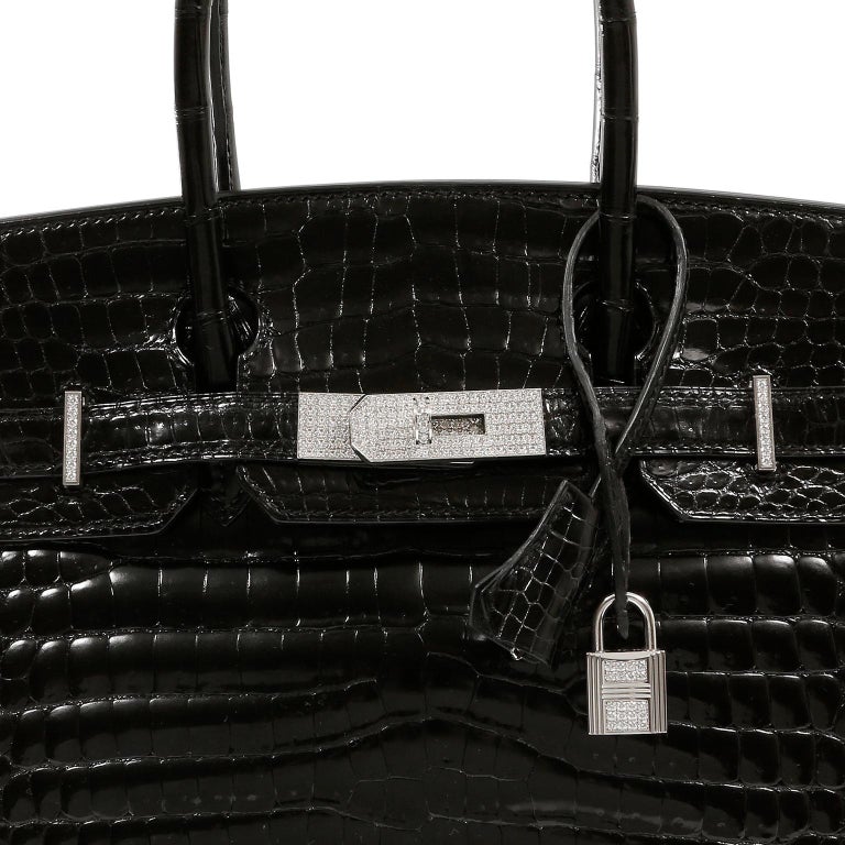 Diamond-encrusted Hermes handbag sold for record $300,000