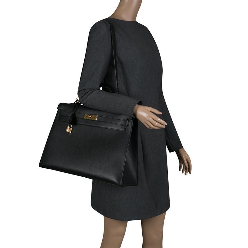 Get set go in this stylish and elegant Hermes leather bag. With a durable leather interior, this is the perfect companion for you. Made beautifully, it comes in an exquisite black color and is waiting for it to be grabbed.

Includes: The Luxury