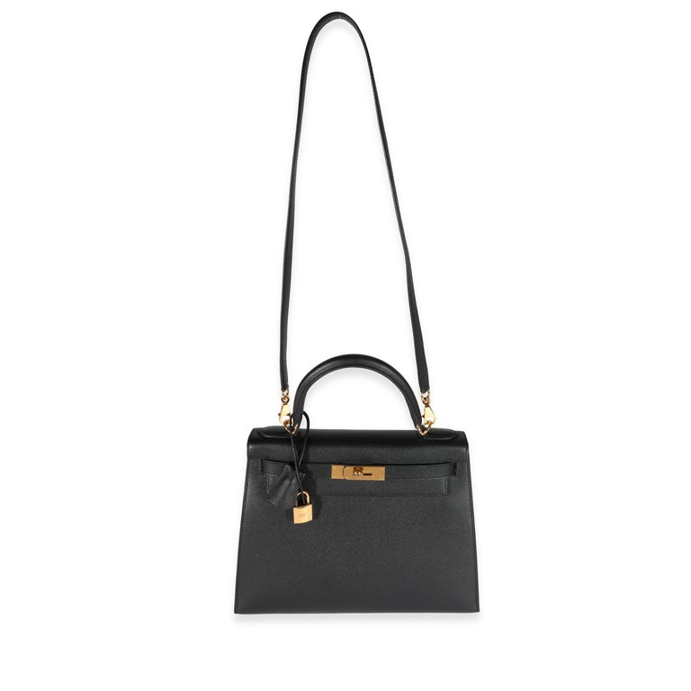 Listing Title: Hermès Black Epsom Sellier Kelly 28 GHW
SKU: 122410
Condition: Pre-owned 
Handbag Condition: Excellent
Condition Comments: Excellent Condition. Plastic on most hardware. Hardware scratching to base. Faint scuff at interior. No other