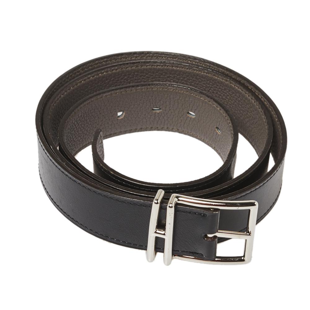 This Hermes belt is well-made and versatile. Crafted from leather, it features a silver-tone buckle for a luxe look. The belt comes in a classic black hue.


