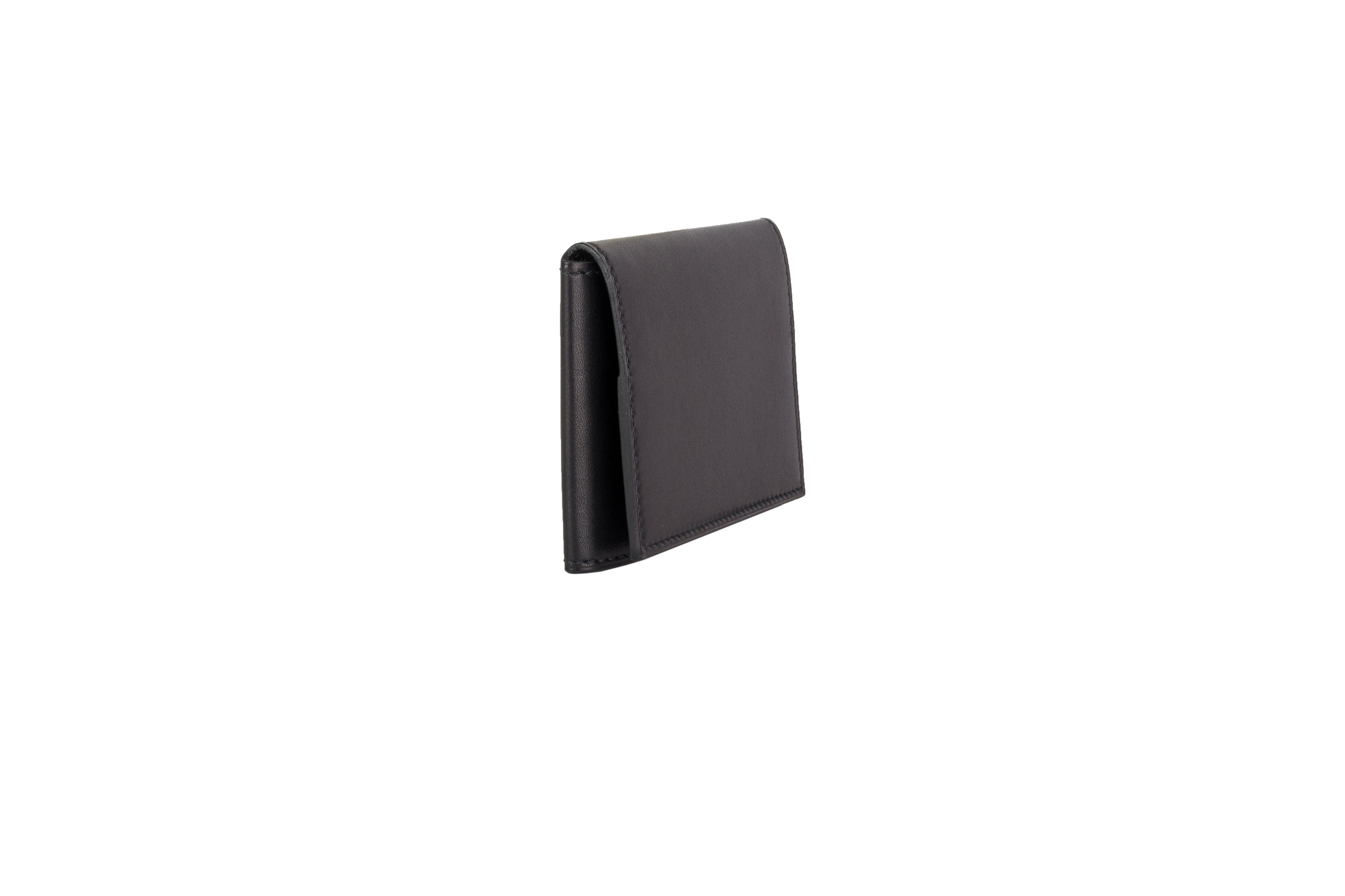 Hermes 'Guernsey' tri-fold credit card wallet in black Veau Eversoft leather. Brand new. Comes with box. 

Width 9cm (3.5in)
Height 6cm (2.3in)
