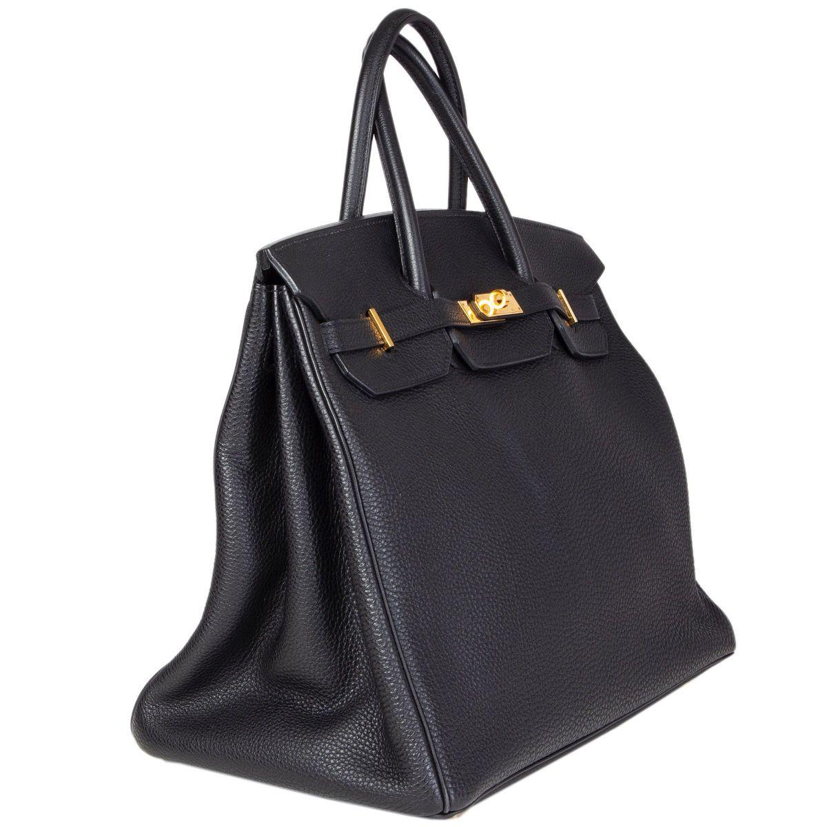 Hermes 'Birkin 40' in black Vache Fjord leather. Lined in Goatskin with an open pocket against the front and a zipper pocket against the back. Has been carried and is in excellent condition. Overall impression of the bag is very good. Comes with