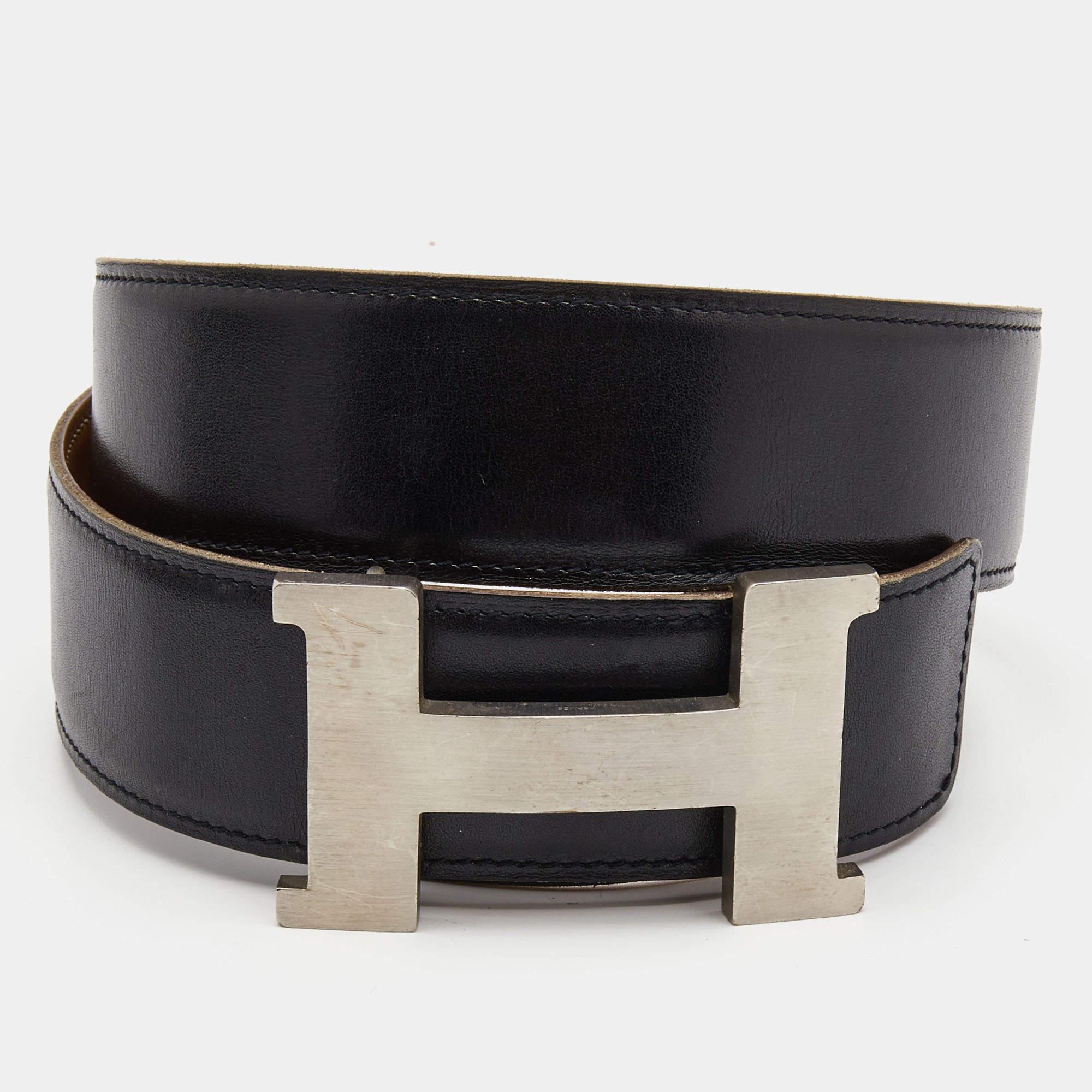 A celebrated design from the range of accessories by Hermès is their H buckle belts. They are worn by celebrities and fashion lovers around the world. Here, we have a reversible version, made from Box Calf and Swift leather with Hermès gold on one