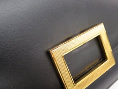Hermes Schwarze Abendtasche im Kelly-Stil mit Goldschnalle, Tragegriff und Klappe