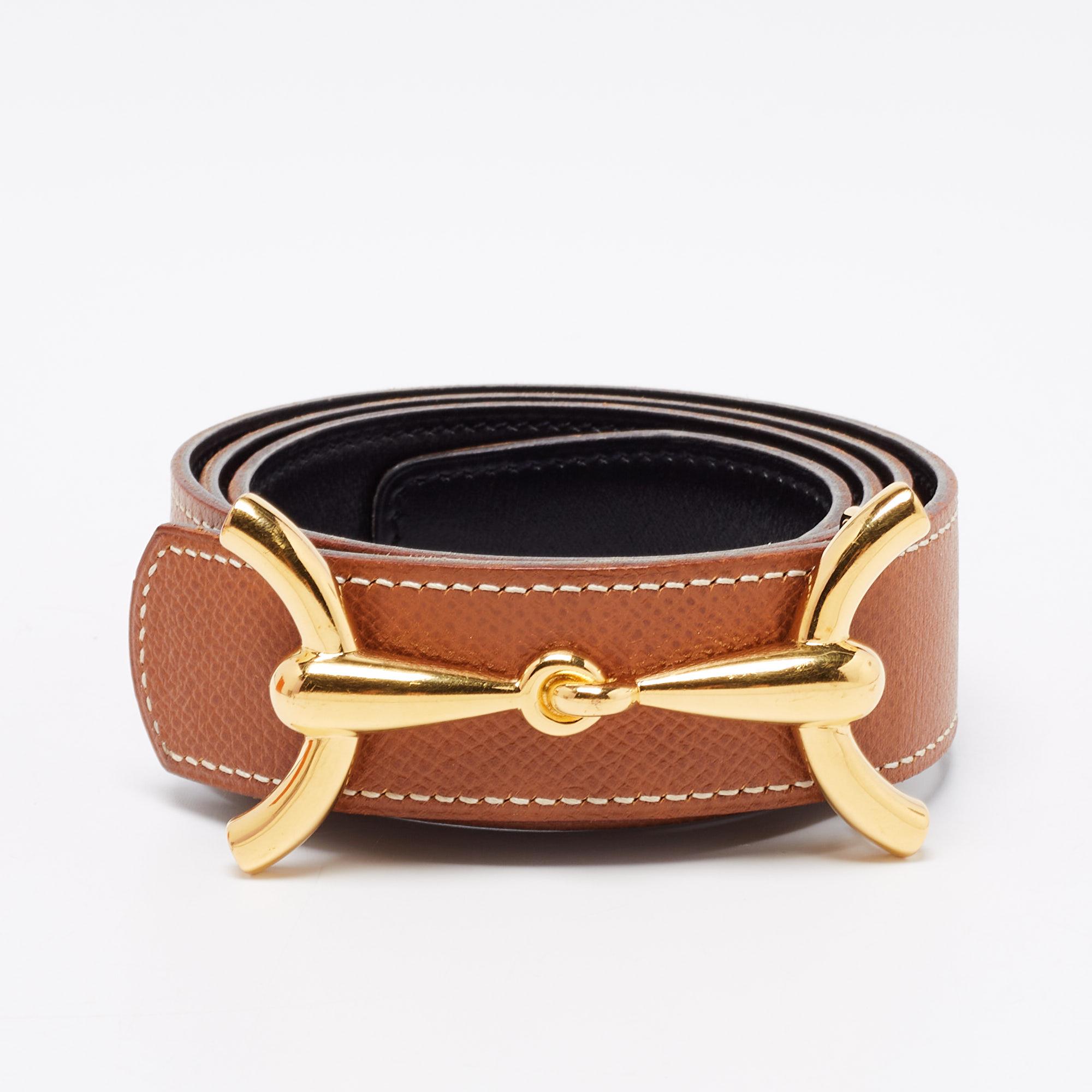 Get the use of two in one with this H Hippique reversible Hermes belt. It is made from Courchevel and Box leather with black on one side and Hermes gold on the other. It is finished with a stunning gold-tone H buckle.

Includes: Original Box
