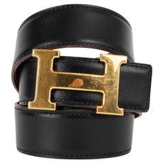 HERMES cintura reversibile in pelle nera e oro con fibbia H. H. 80