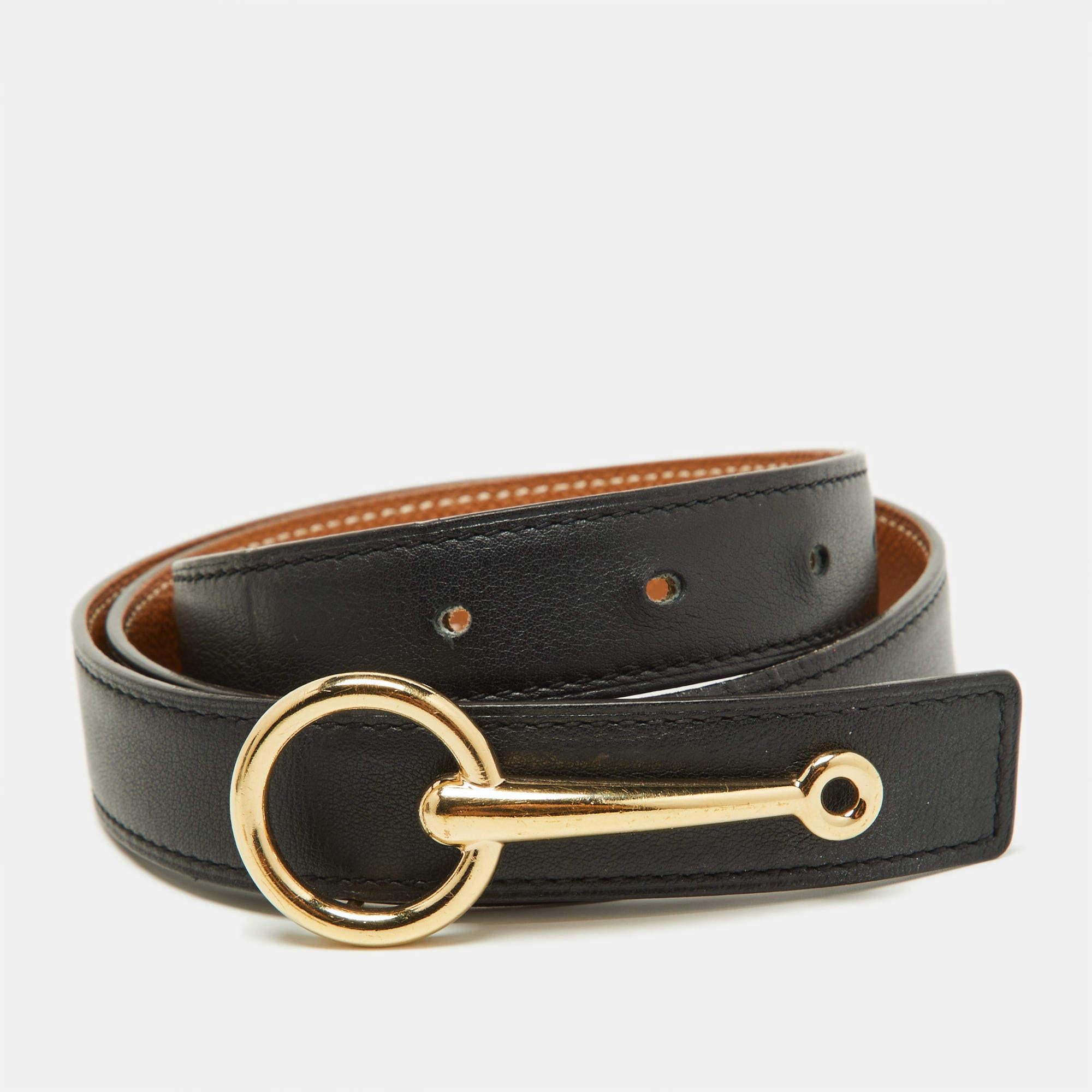 The Hermes Mors buckle belt is a luxurious accessory crafted from premium materials. It features a distinctive buckle, symbolizing Hermes' elegance and sophistication. This timeless belt effortlessly enhances any outfit, making it a coveted choice