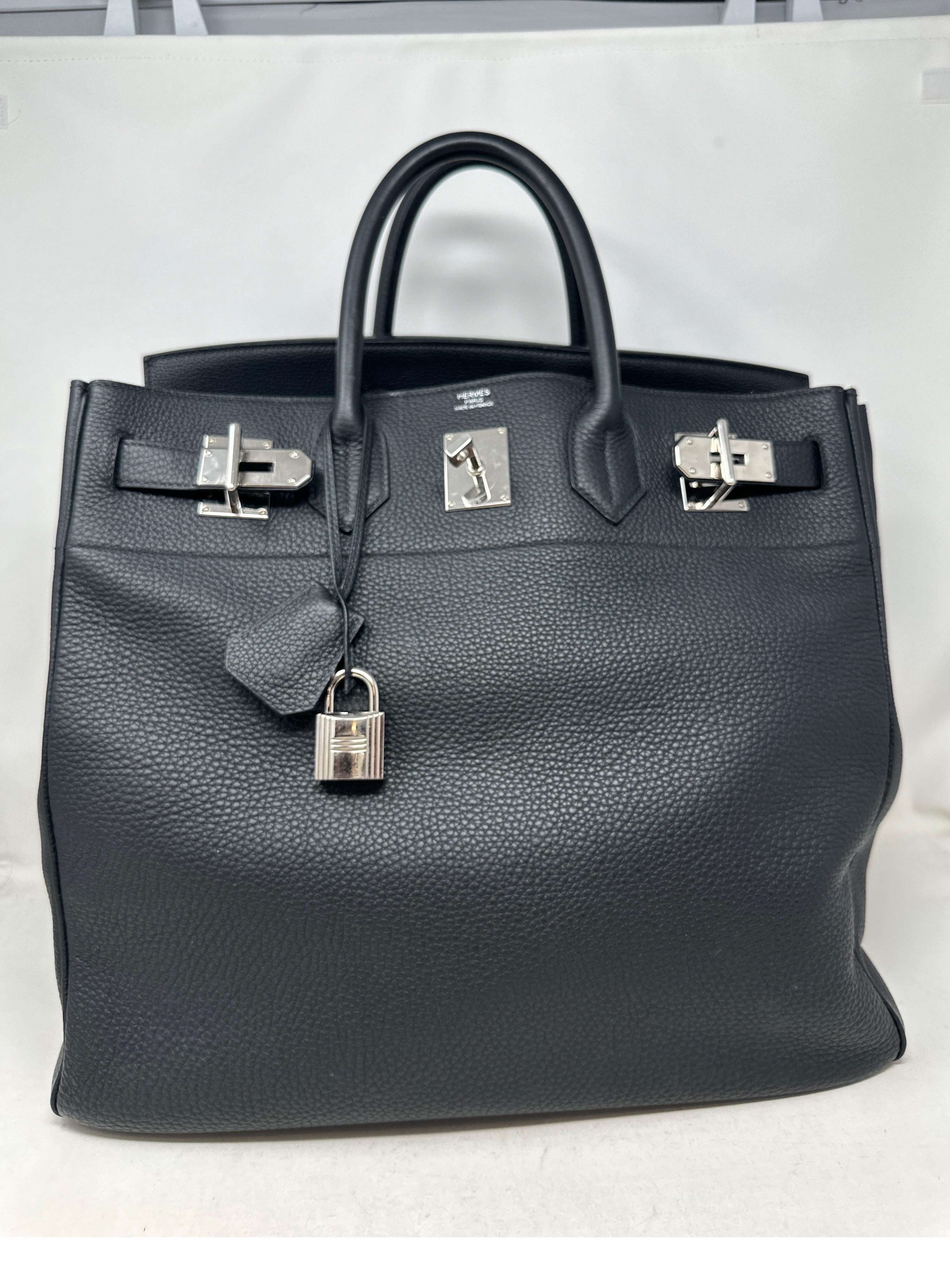 Hermes Black HAC 40 Bag. New HAC luggage from Hermes. Big carry on size bag. Togo leather. Excellent condition. Interior clean. Palladium silver hardware. Includes clochette, lock, and keys. Guaranteed authentic. 