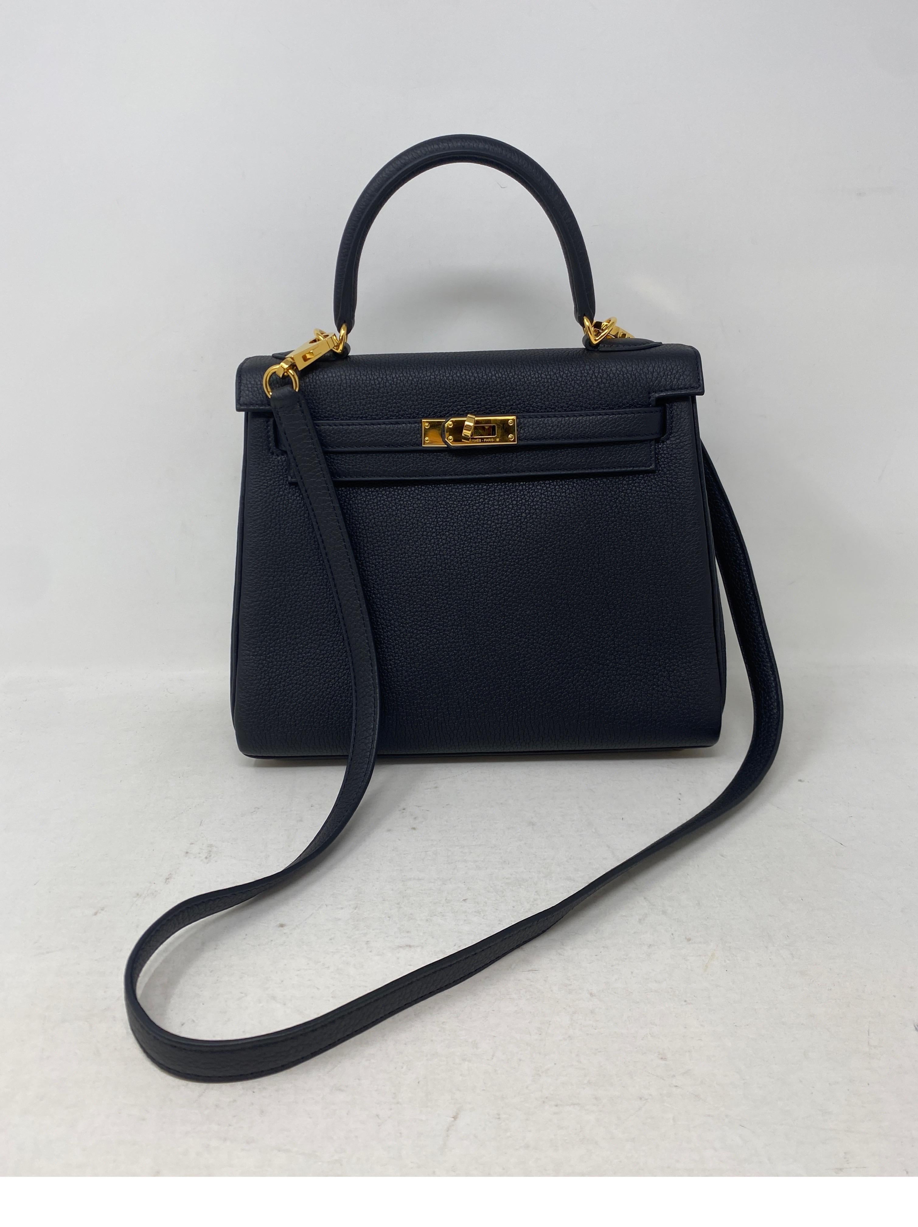 Hermes Black Kelly 25 Bag. Gold hardware. The most wanted unicorn Kelly size. So hard to find size 25. Brand new Kelly bag. Togo leather. Includes full set. Clochette, lock ,keys, dust bag, and box. Guaranteed authentic. The perfect gift. 