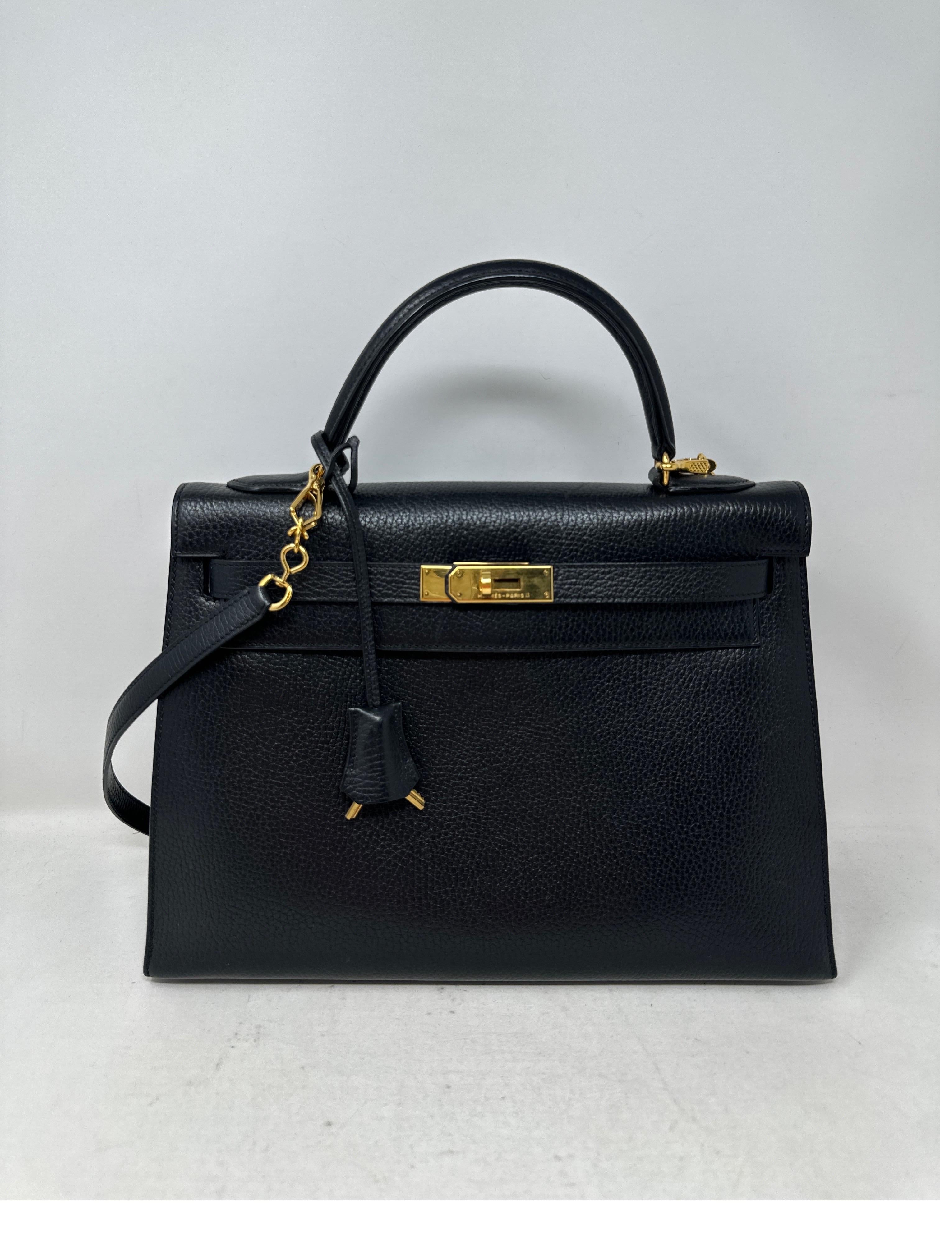 Hermes Black Kelly 28 Bag. Excellent condition. Gold hardware. Sellier bag. Interior clean. Includes clochette, lock, keys, and dust bag. Guaranteed authentic. 