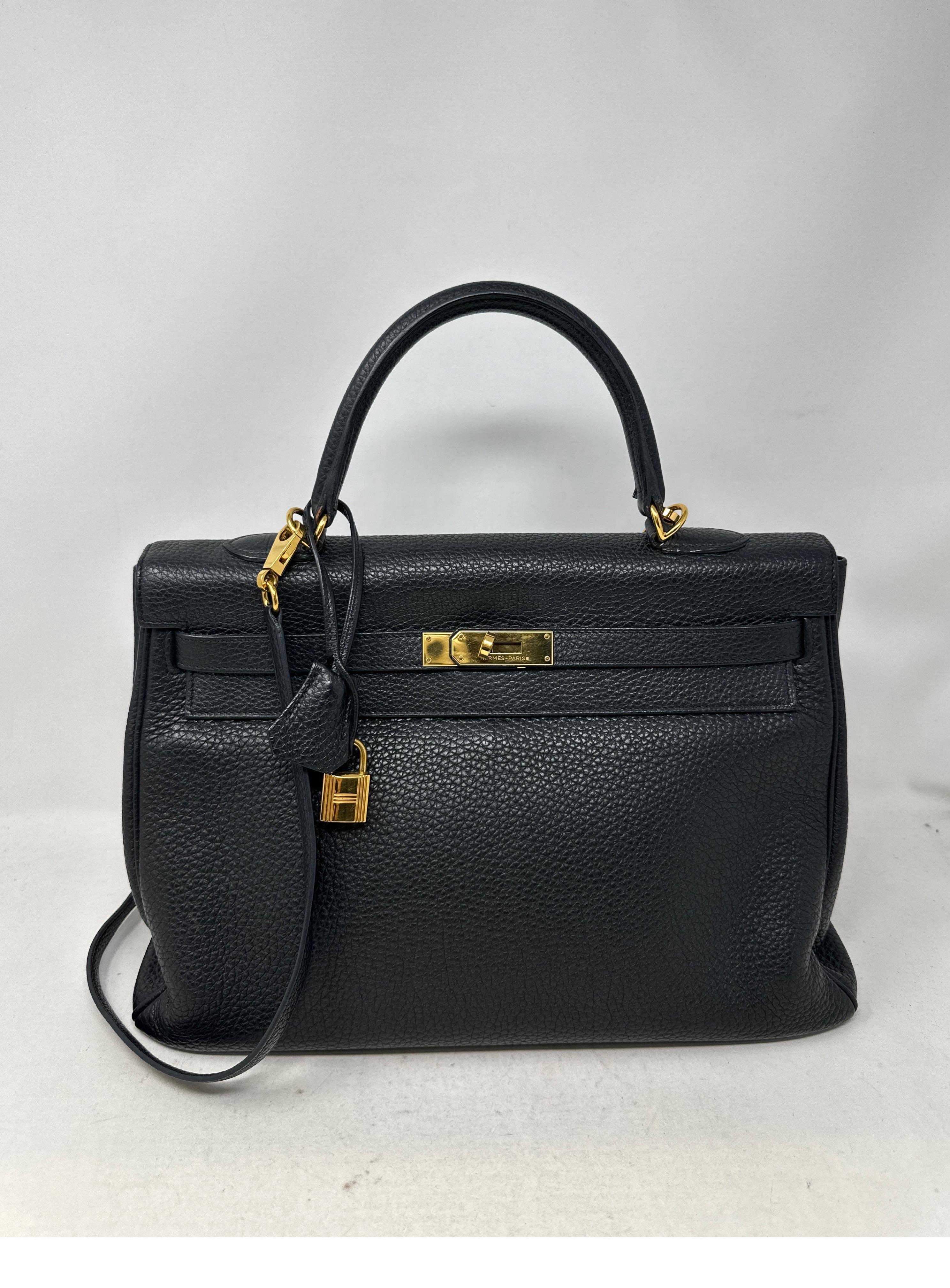 Hermes Black Kelly 35 Bag. Good condition. Togo leather black with gold hardware. Classic bag for all collectors. Kelly has the detachable strap. Has light wear on corners. Please see all photos. Great classic size and color combo. Includes