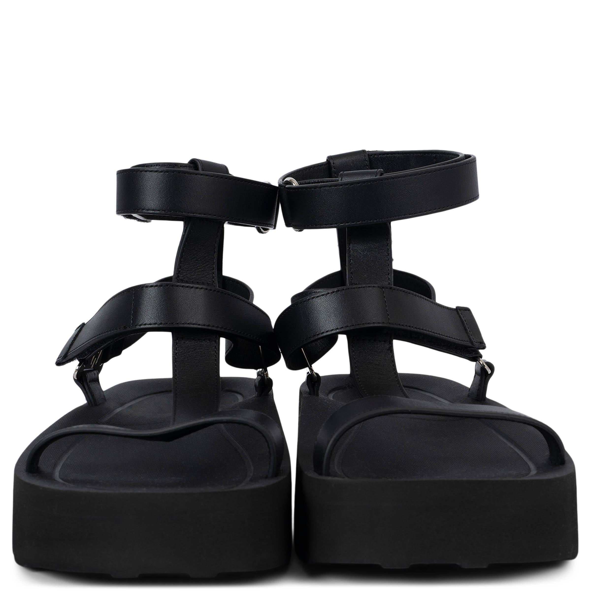100% authentic Hermès Enid gladiator platform sandals in black calfskin with velcro closure set on an ultra-light, comfortable sole. Characteristics of the Maison “H Diamant” clasp detail in Palladium. Brand new. 

Measurements
Model	H221033Z