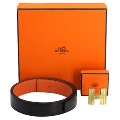 Hermès Black Leather and Gold Toned Bronze Reeded H Buckle