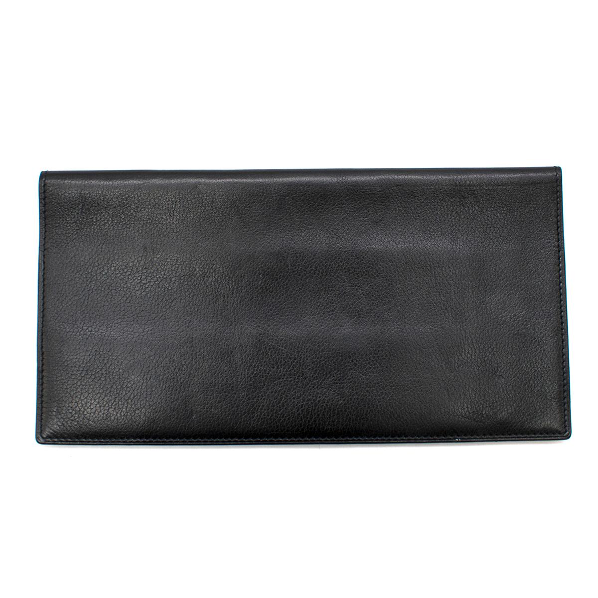 Hermes black leather bi-fold travel wallet

- Serial Number: [H]
- Age (Circa): 2004
- Black, box calf leather 
- Black lacquered edges, black top stitching
- Bi-fold opening 
- Four internal slip pockets
- Comes with a box.

Please note, these