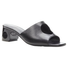 Hermès Schwarze Lederstiefelettensandalen mit durchbrochenem Absatz und offenem Zehenbereich EU37